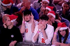 Heartbroken England fans watch World Cup exit as French supporters ‘turn London blue’
