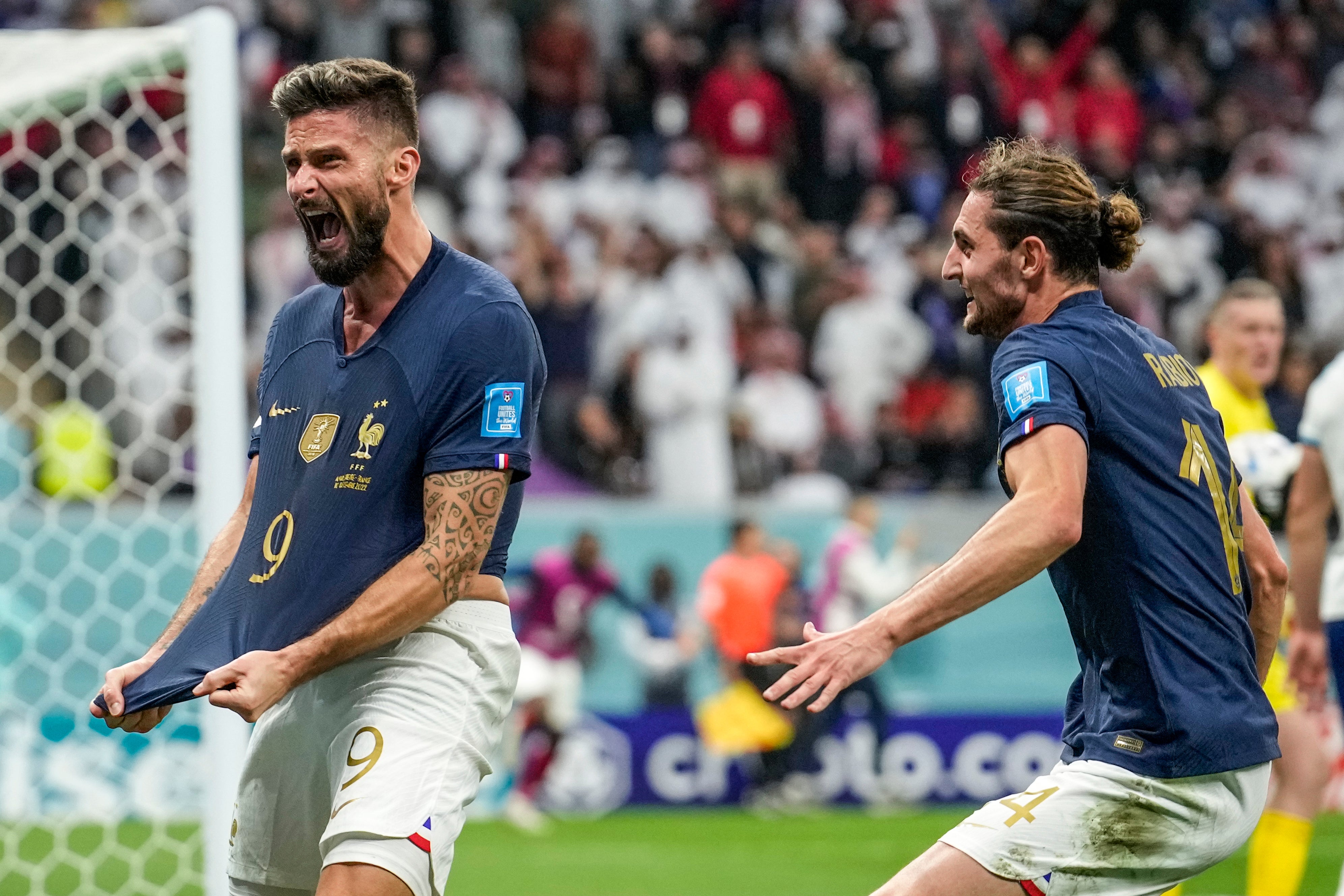 Olivier Giroud celebrates scoring for France