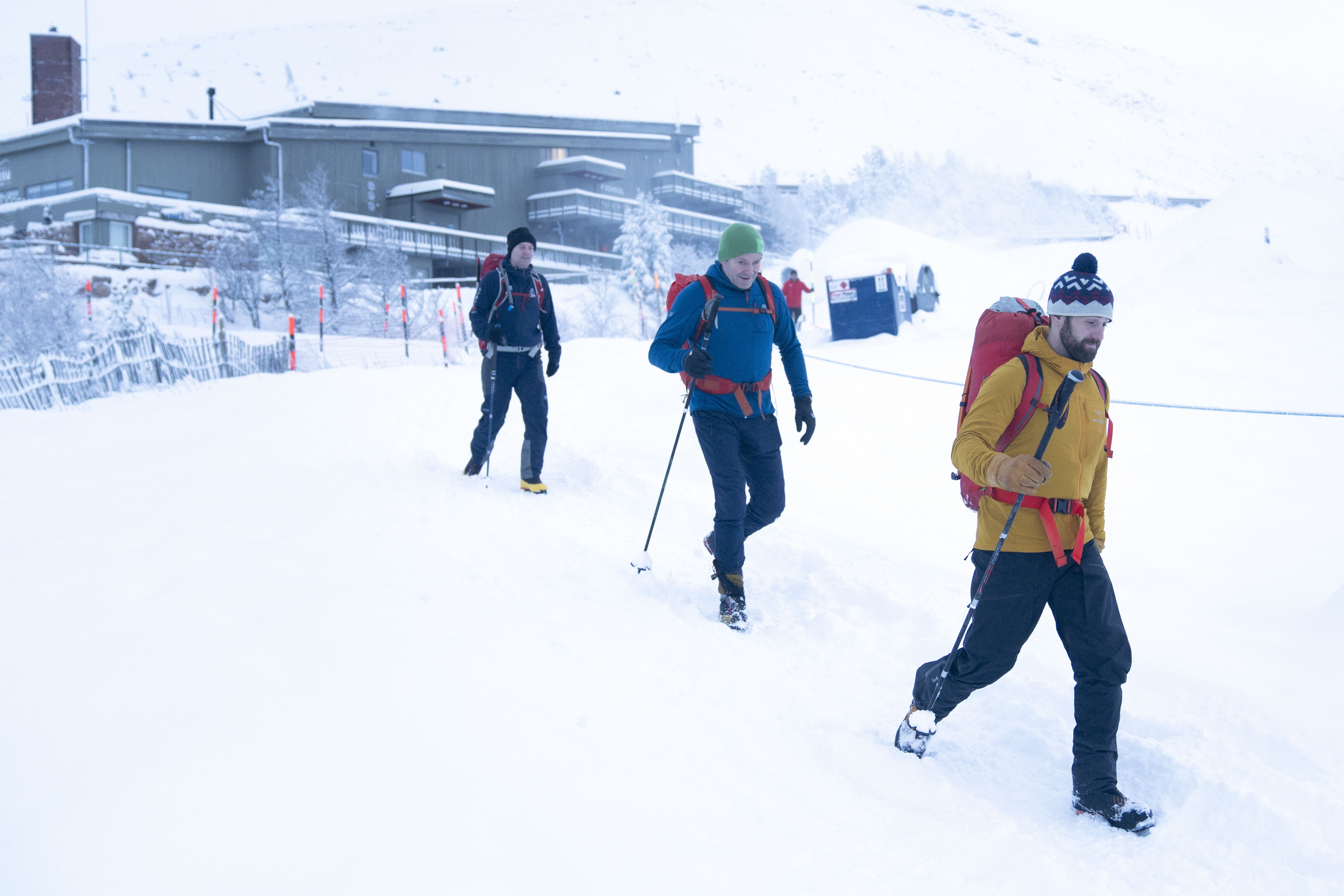 Walkers in snowy conditions in the Cairngorms National Park near Aviemore. (PA)