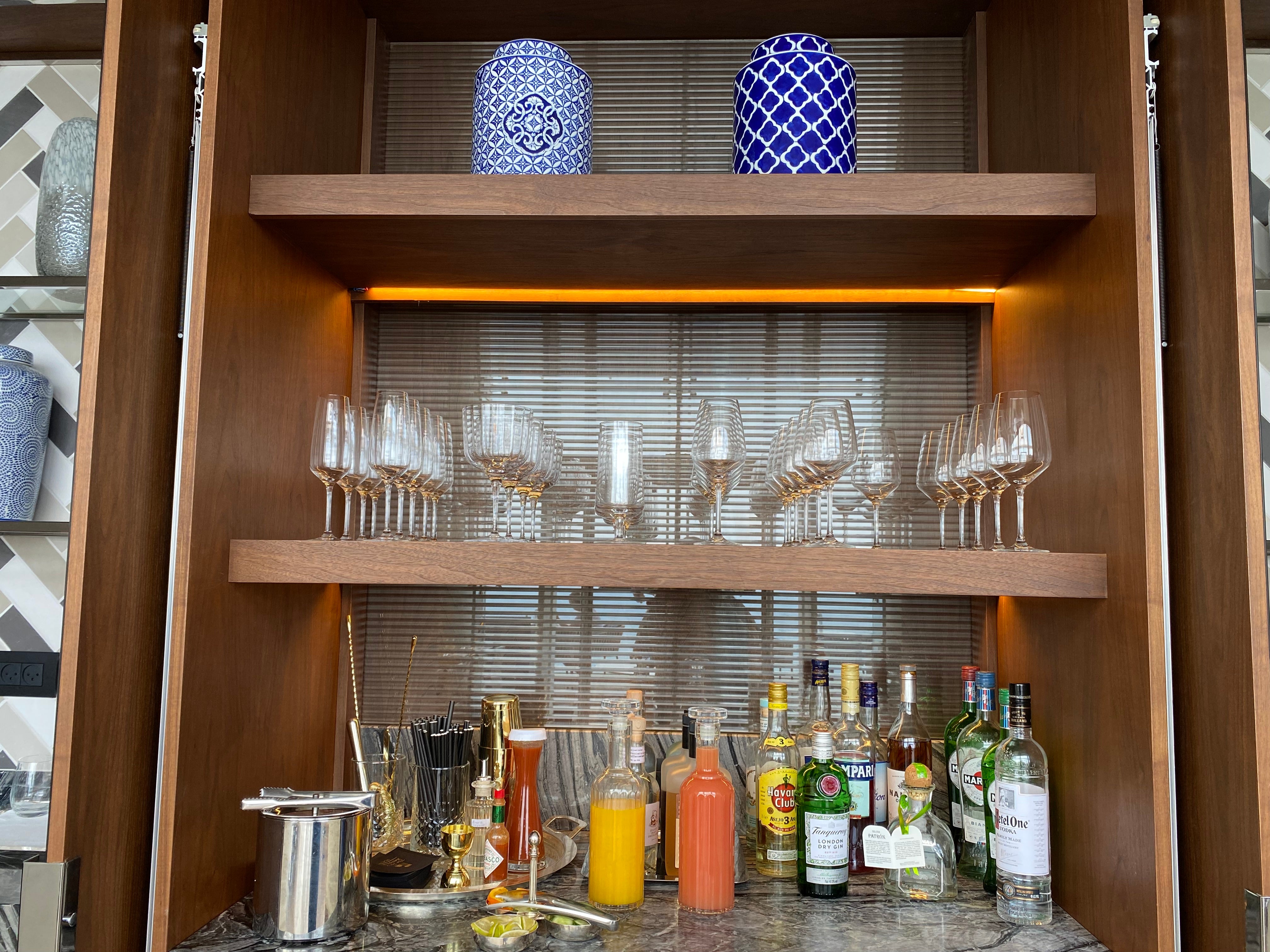 The lounge includes a stocked bar