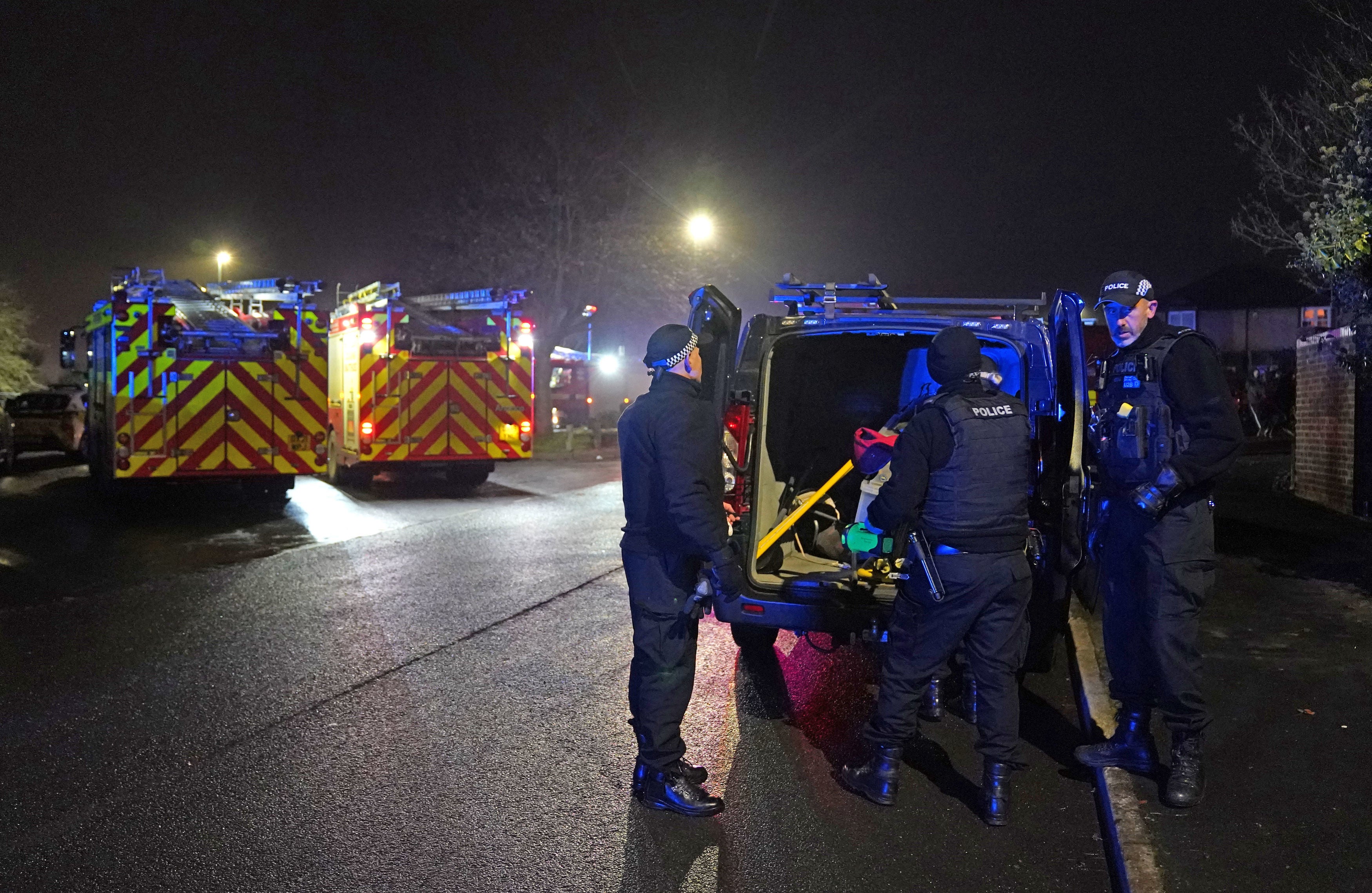 Emergency personnel at the scene in Kingshurst, Solihull after children were pulled from a lake