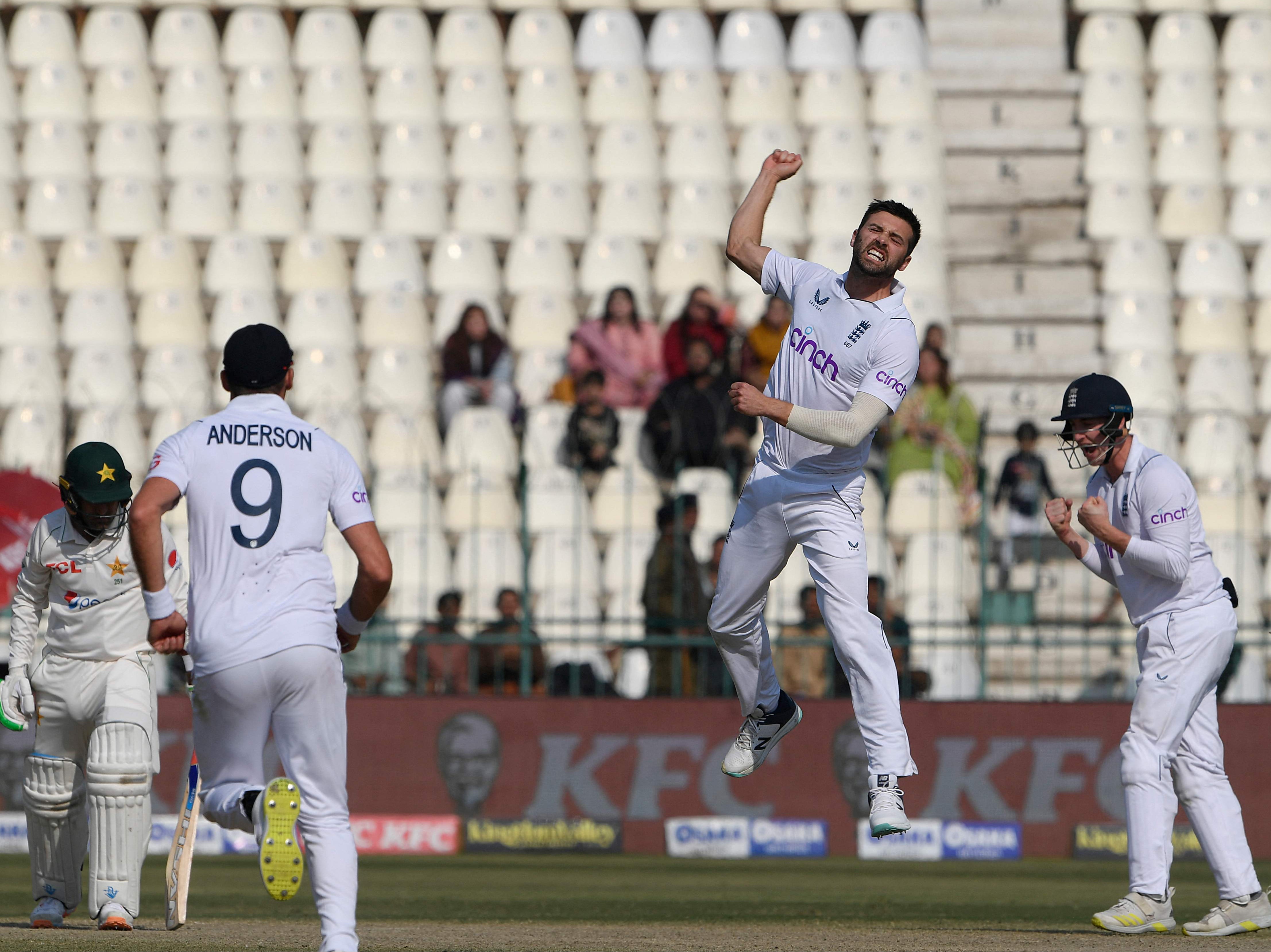 Mark Wood celebrates after taking the wicket of Zahid Mahmood in Multan