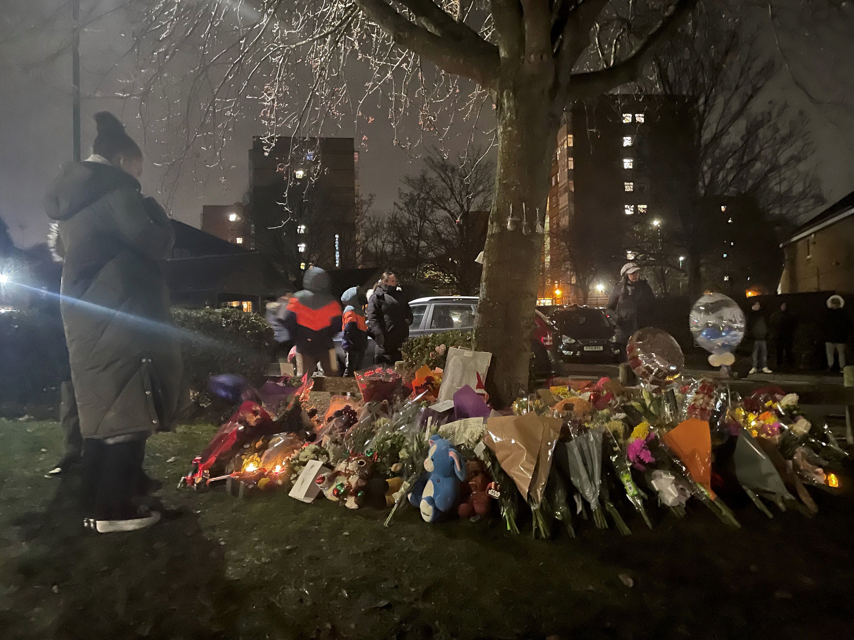 Residents gathered for a vigil for the boys on Monday evening