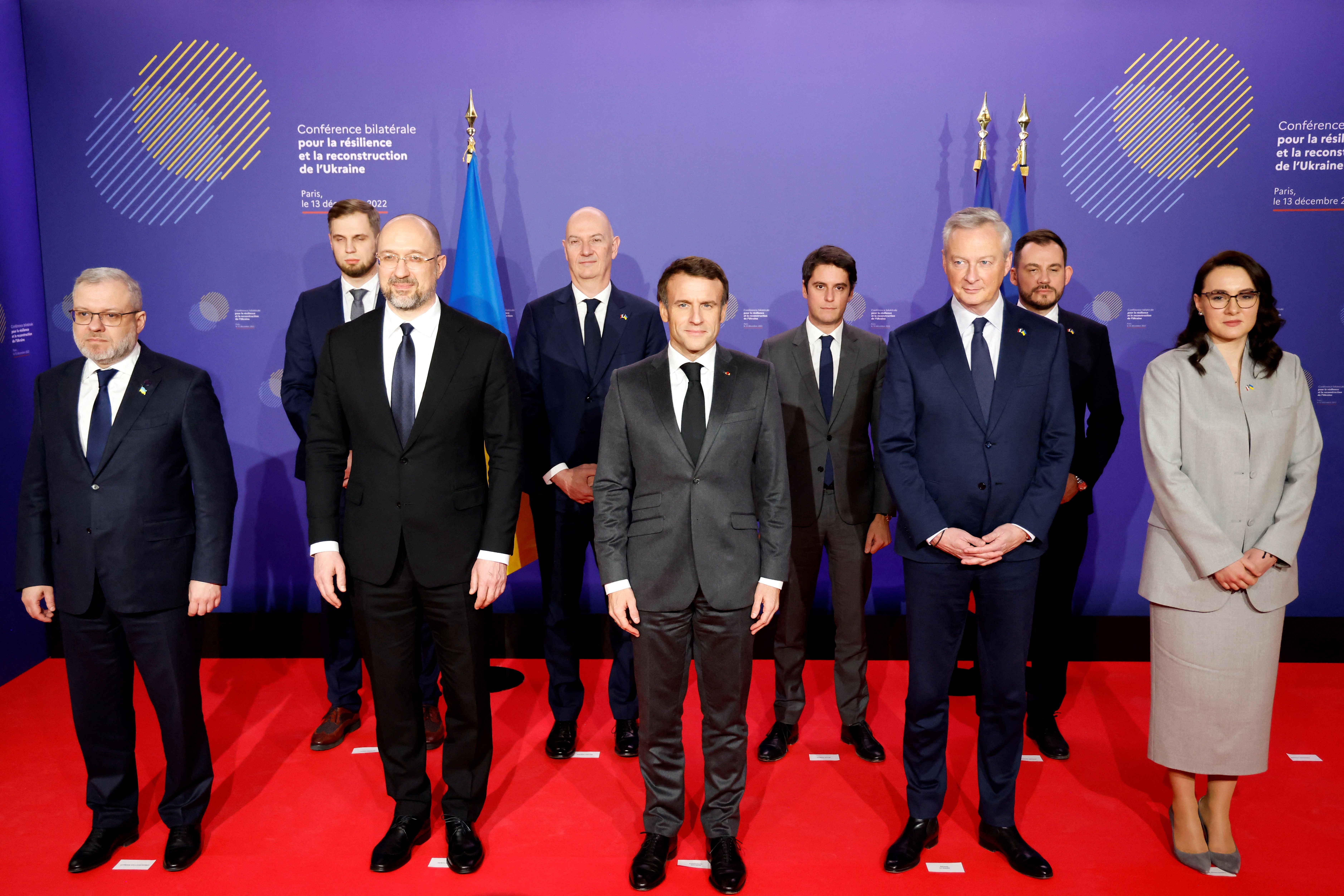 World leaders and ministers pose for a photo at the opening of the French-Ukrainian conference for resilience and reconstruction in Paris