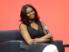 Michelle Obama reacts to viral clip of Barack and fan: ‘He doesn’t need to know my business’