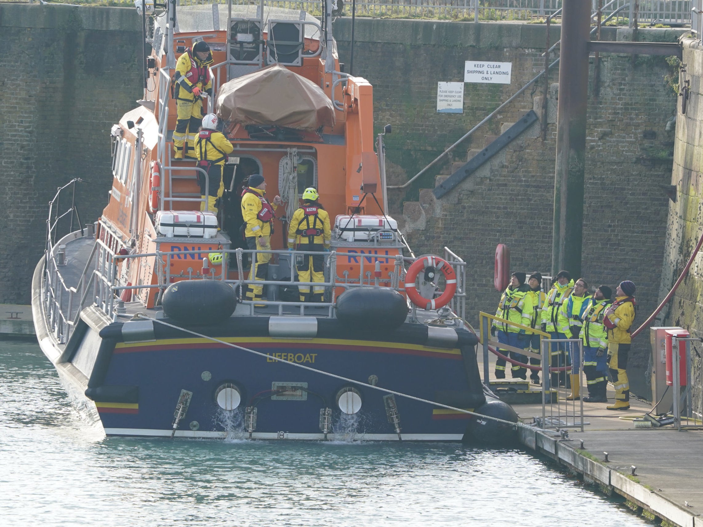 The Dover lifeboat returns to the Port of Dover after a large search and rescue operation launched in the Channel