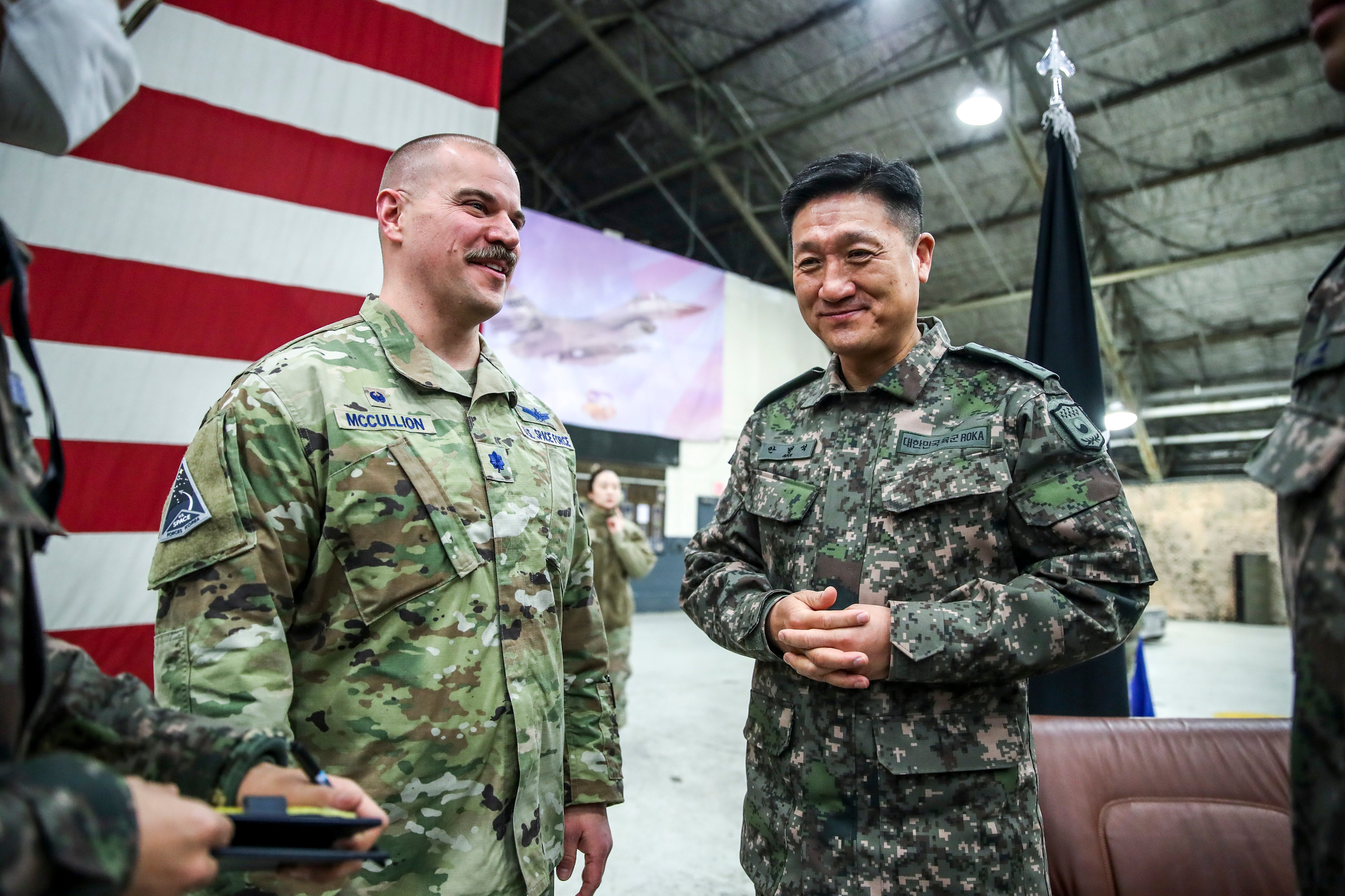 Lt Col Joshua McCullion, Commander of the US Space Forces Korea, talks with South Korean Gen. Ahn Byung-seok, deputy commander of the South Korea-US Combined Forces Command