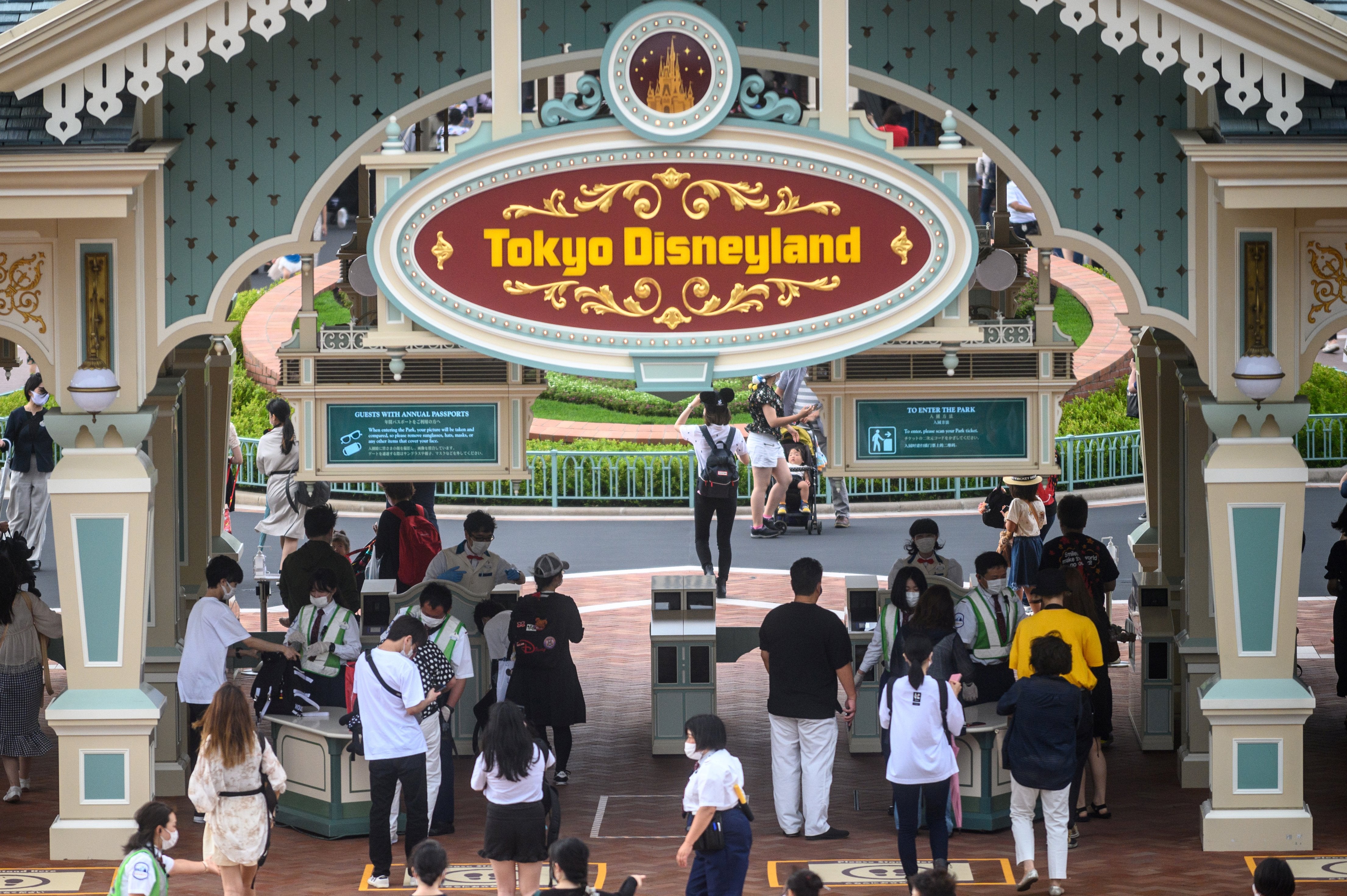 File image: Disneyland Christmas parade obstructed by a middle aged man