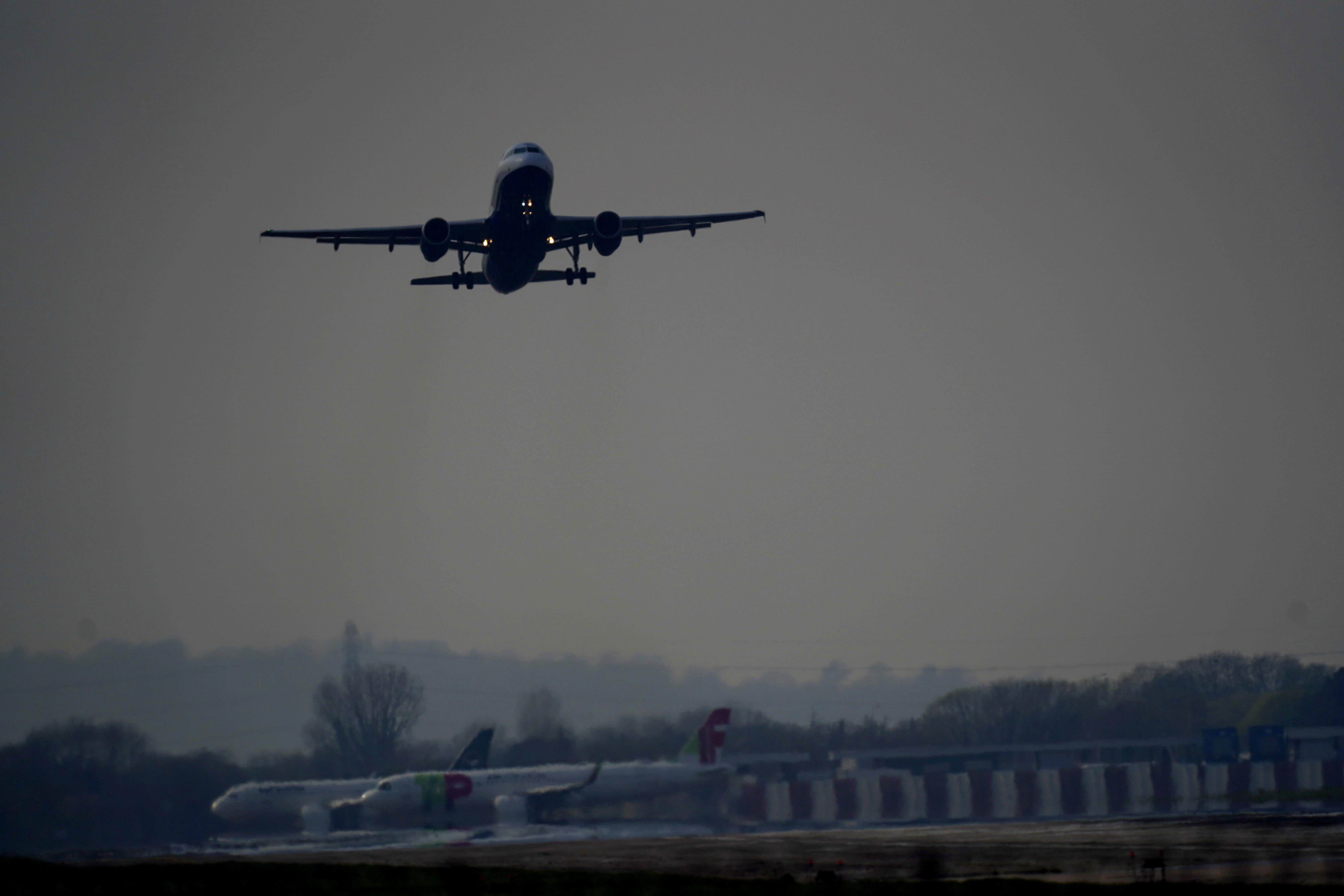 A plane takes off from Heathrow airport in West London (Steve Parsons/PA)