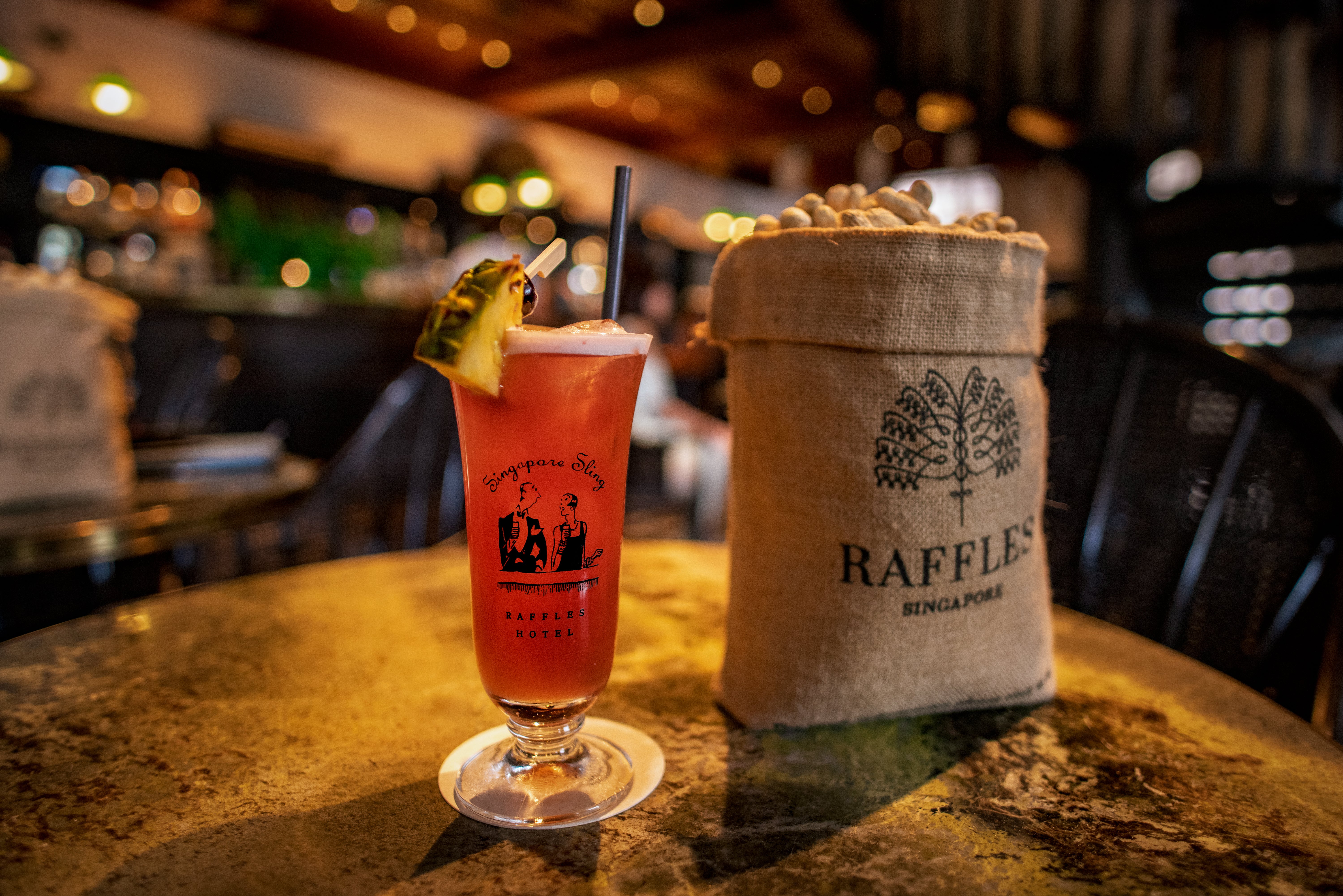 Start your gastronomic tour with a Singapore Sling cocktail at Raffles Hotel