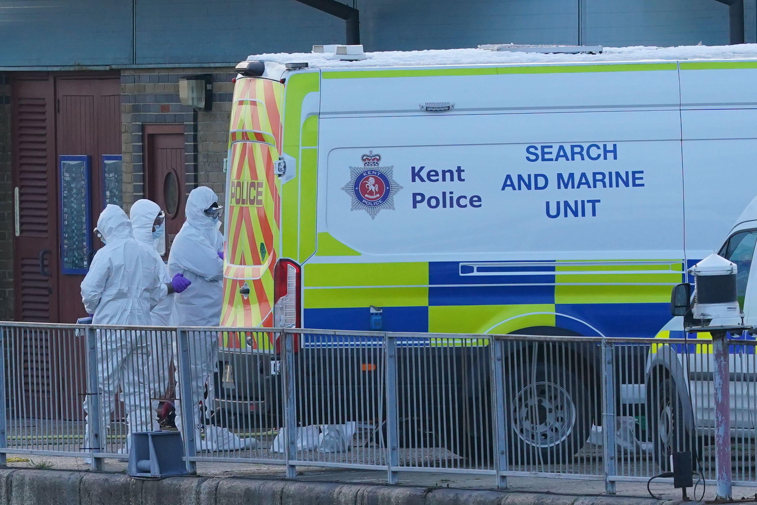 Police forensic officers at the RNLI station at the Port of Dover (Gareth Fuller/PA)