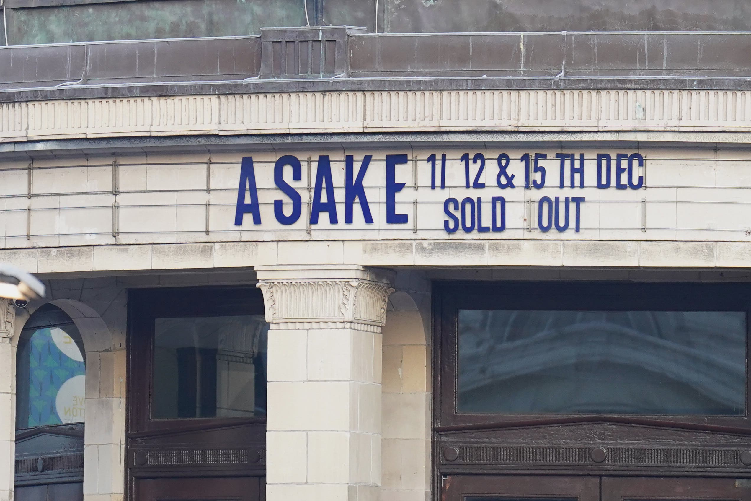 The scene outside Brixton O2 Academy where police are investigating the circumstances which led to four people sustaining critical injuries in an apparent crush as a large crowd tried to force their way into the south London concert venue (James Manning/PA)