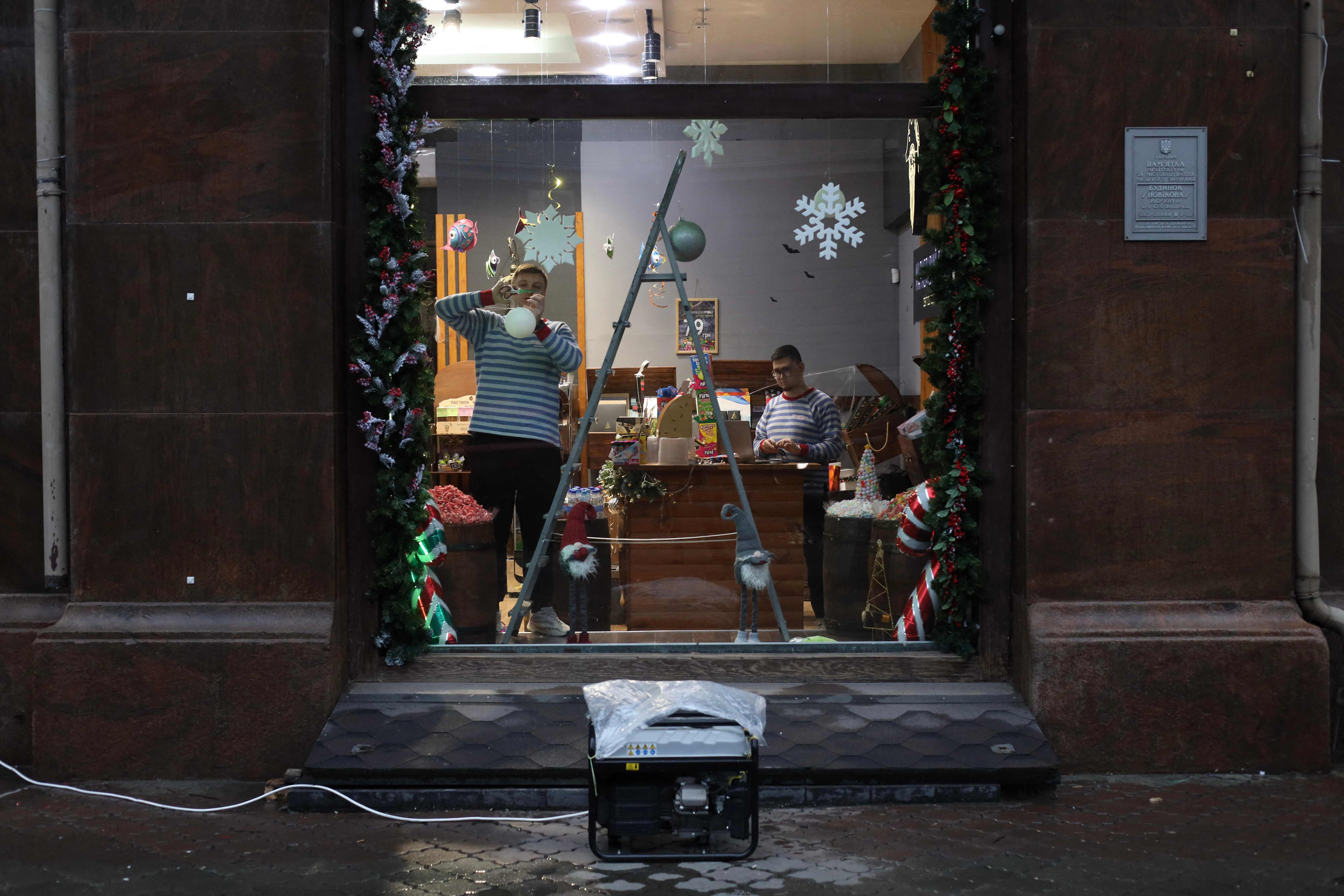 A power generator outside a shop in the centre of Odesa