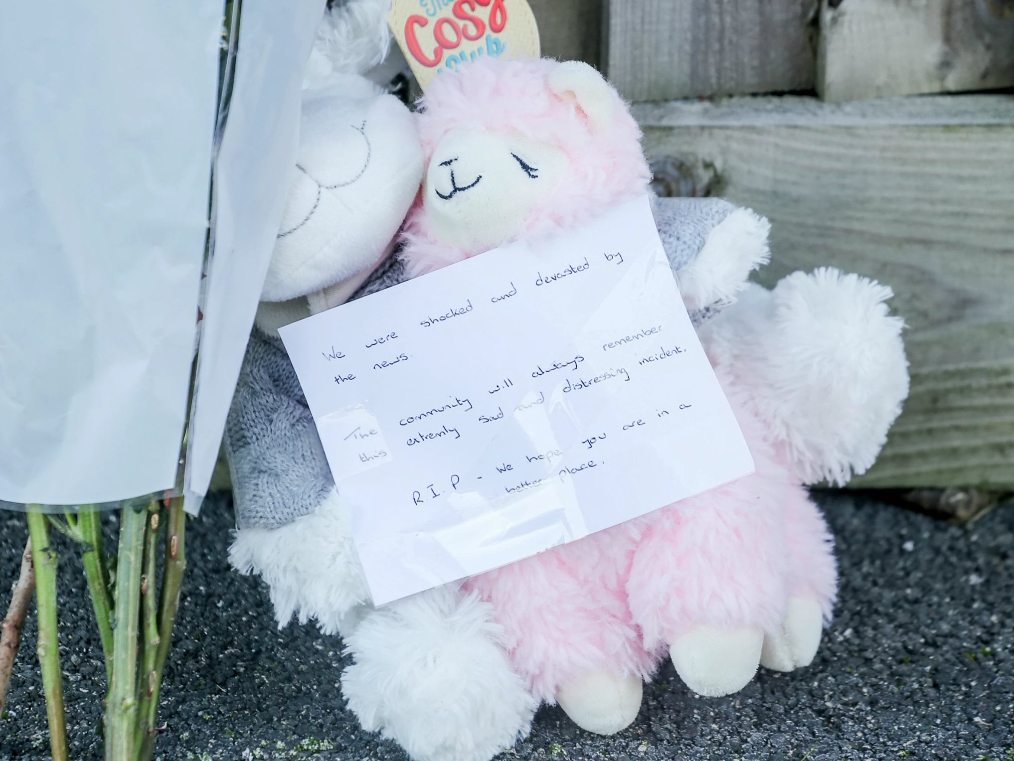 A note left with soft toys at the scene reads ‘The community will always remember this extremely sad and distressing incident’