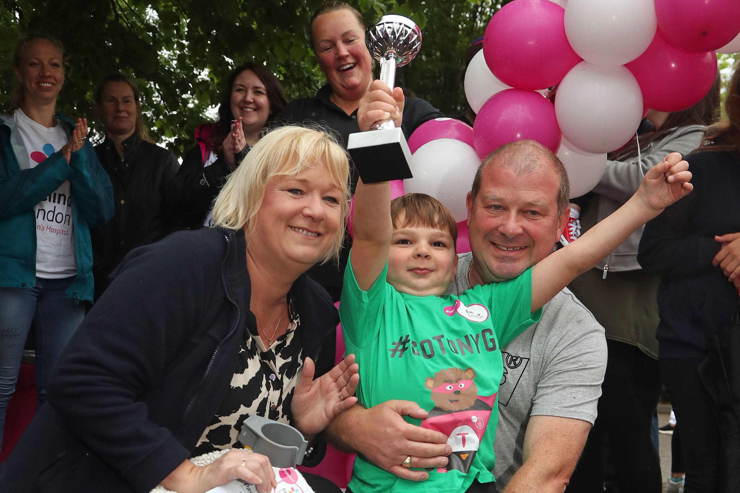 Tony Hudgell with his adoptive mother Paula and father Mark (Gareth Fukller/PA)