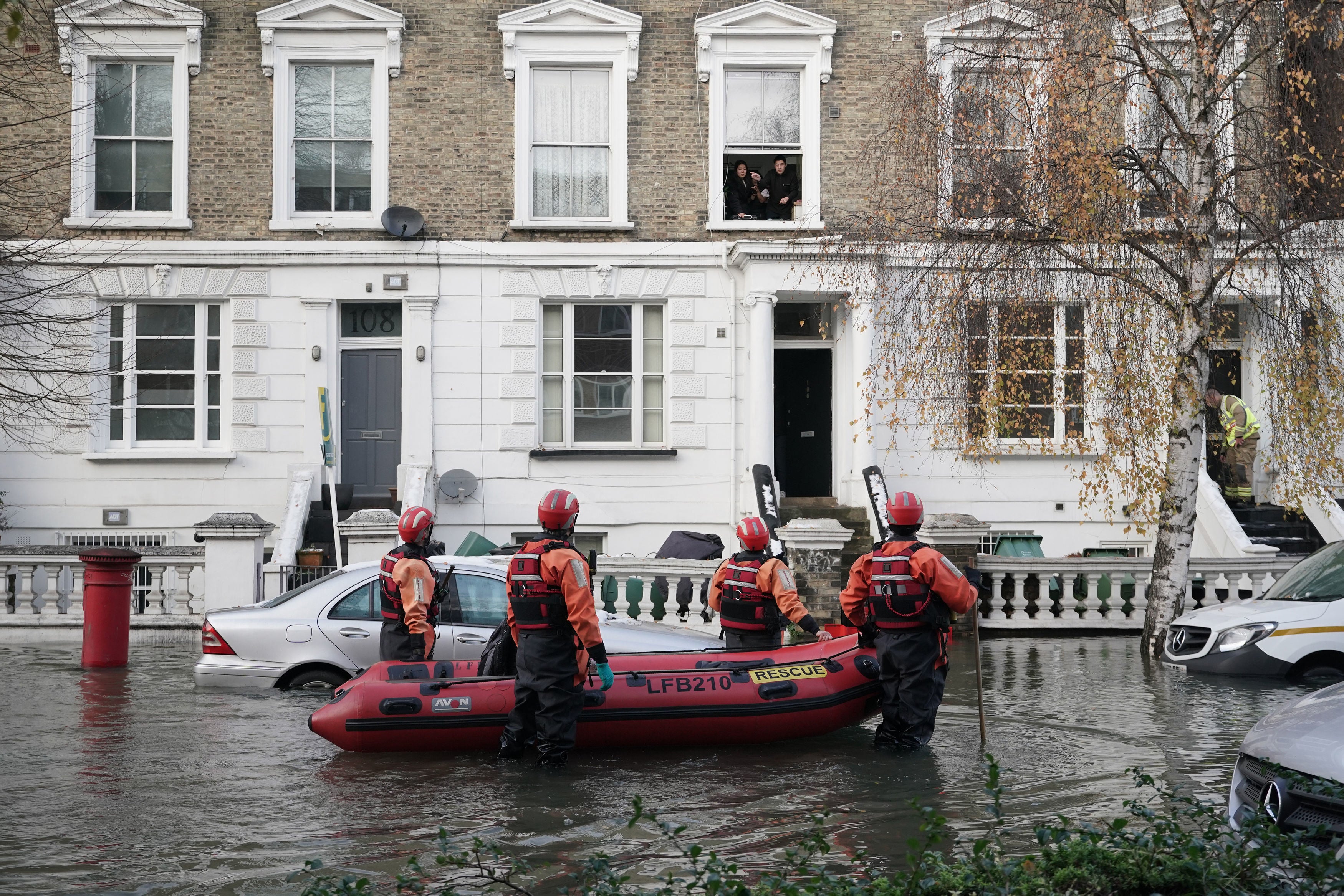 Emergency services on Belsize Road in Camden after a burst water main flooded the London street last weekend