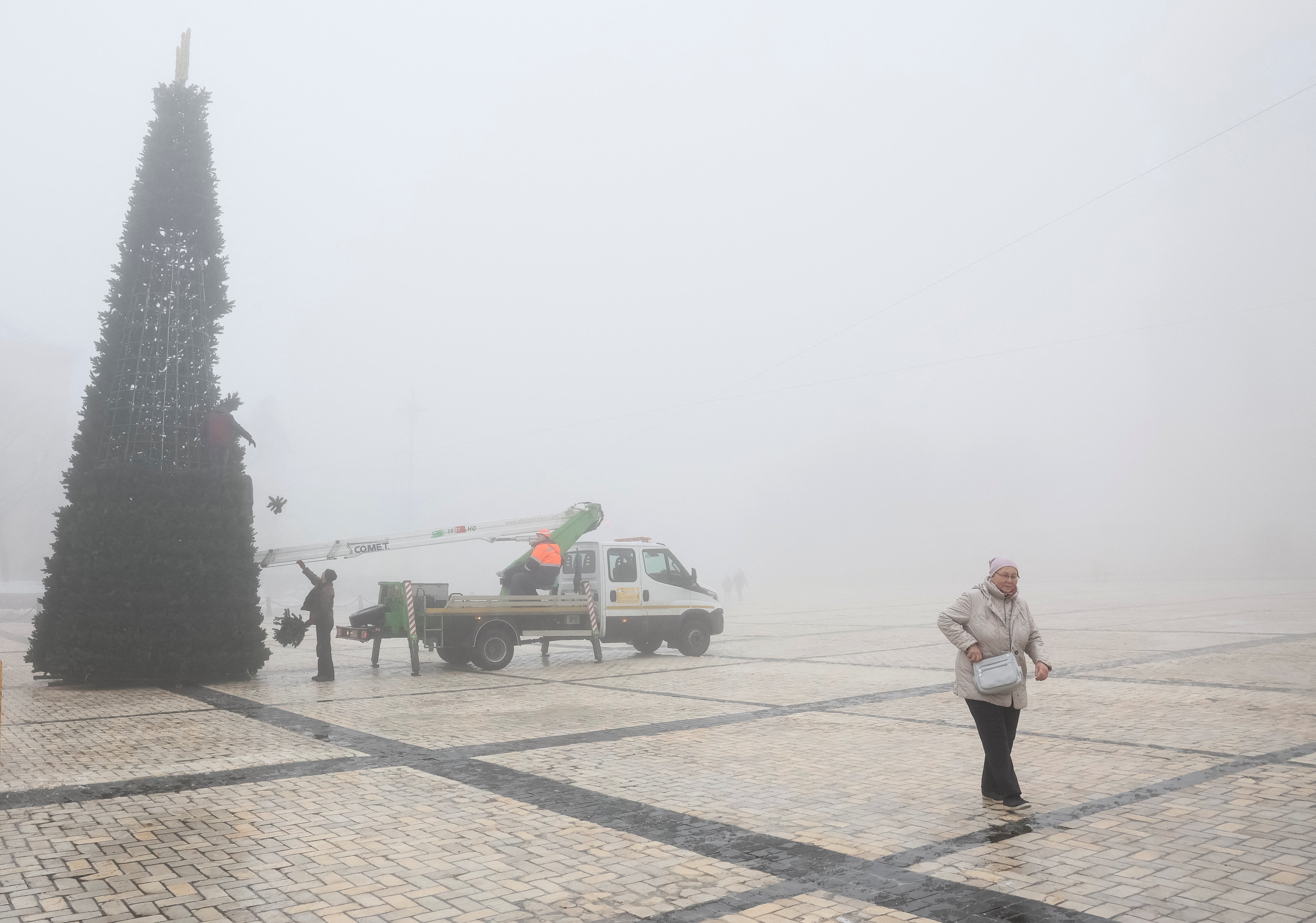 Installing the tree during heavy fog today