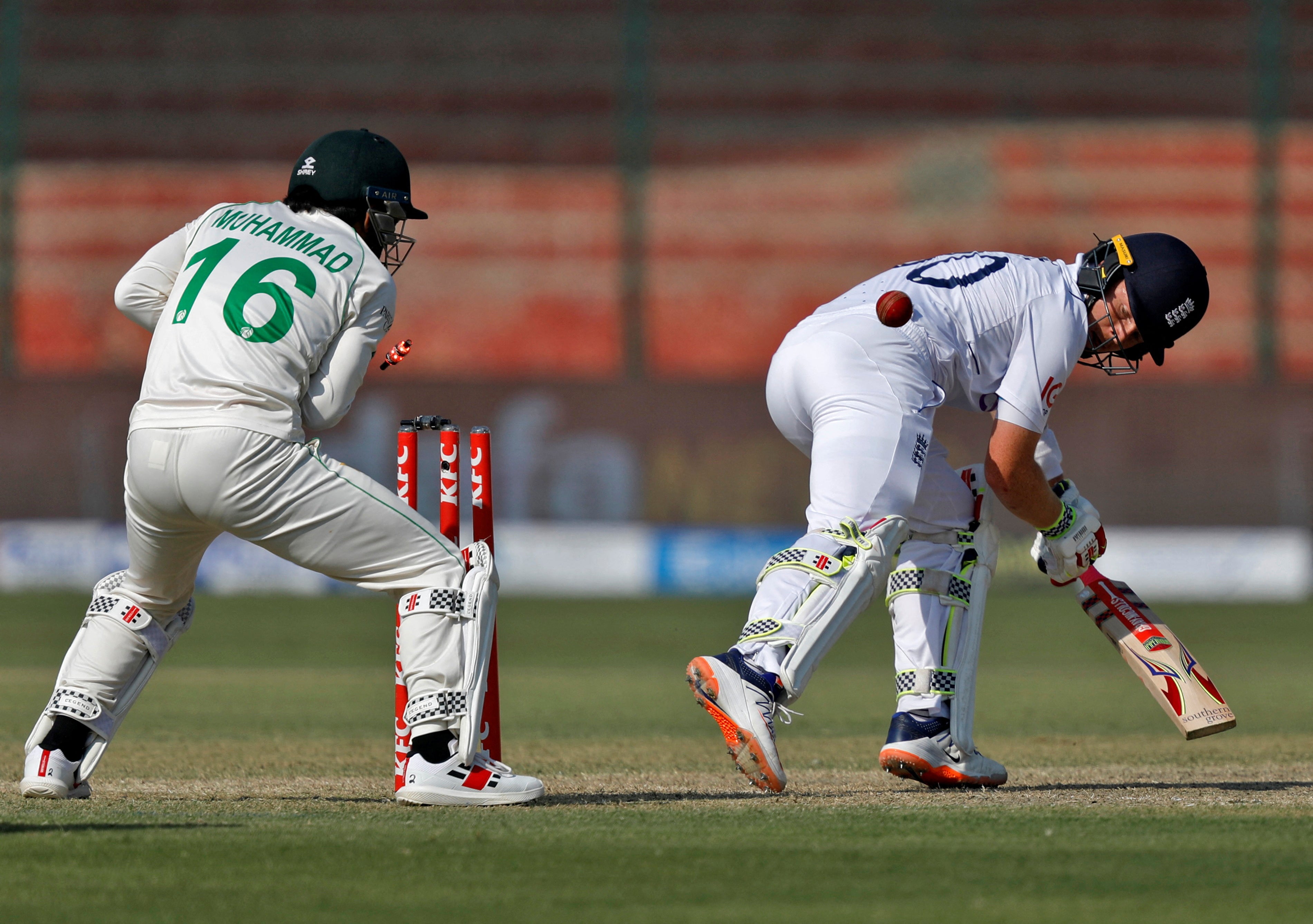 England’s Ollie Pope is bowled out