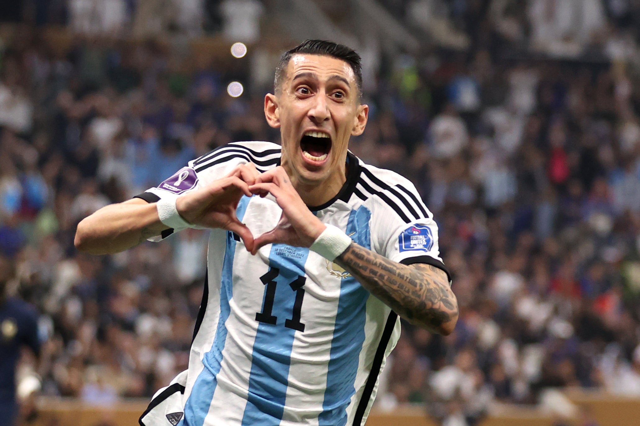 Di Maria reels away in celebration