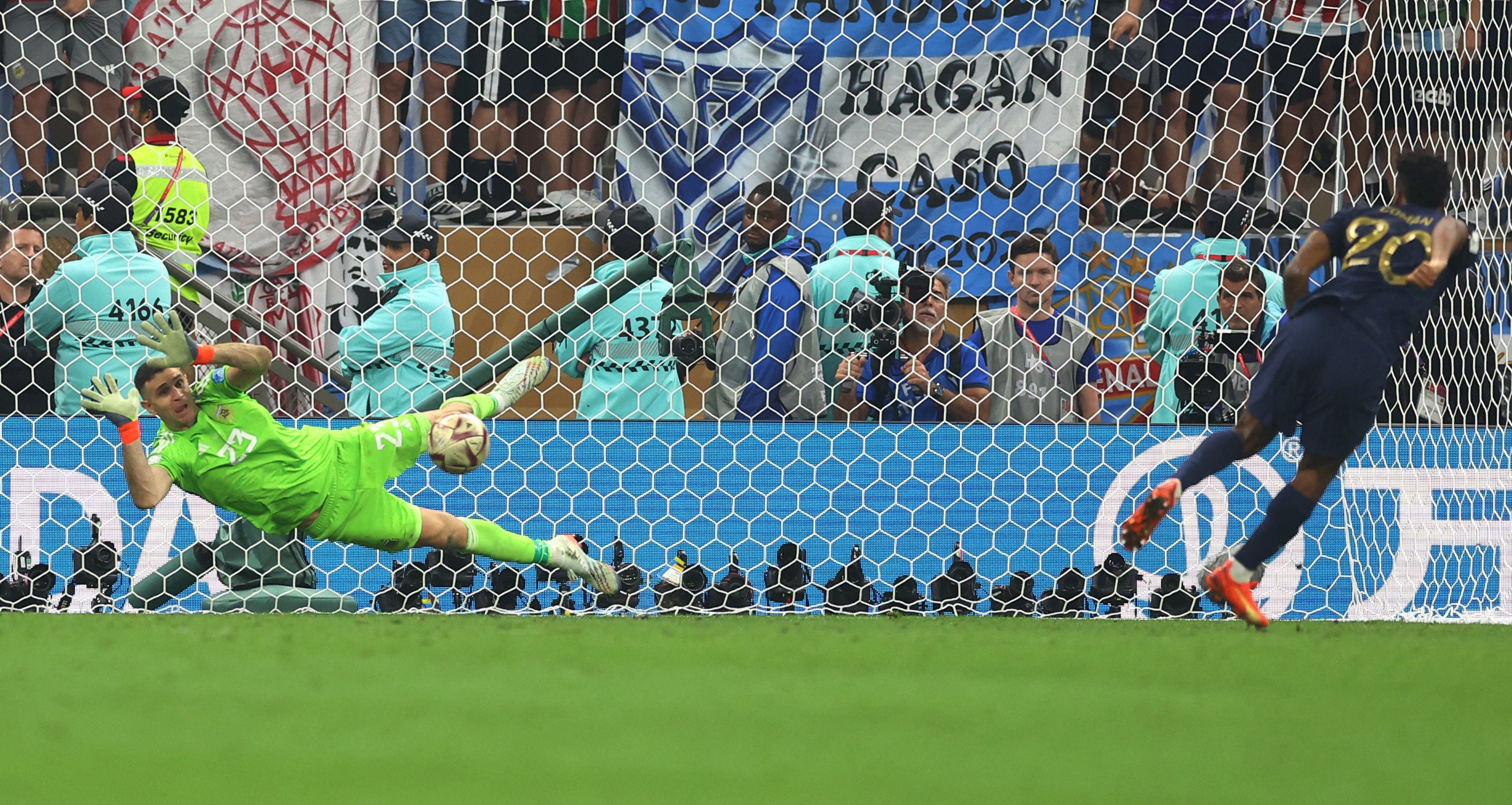 Emiliano Martinez saves Kingsley Coman’s penalty during the shootout