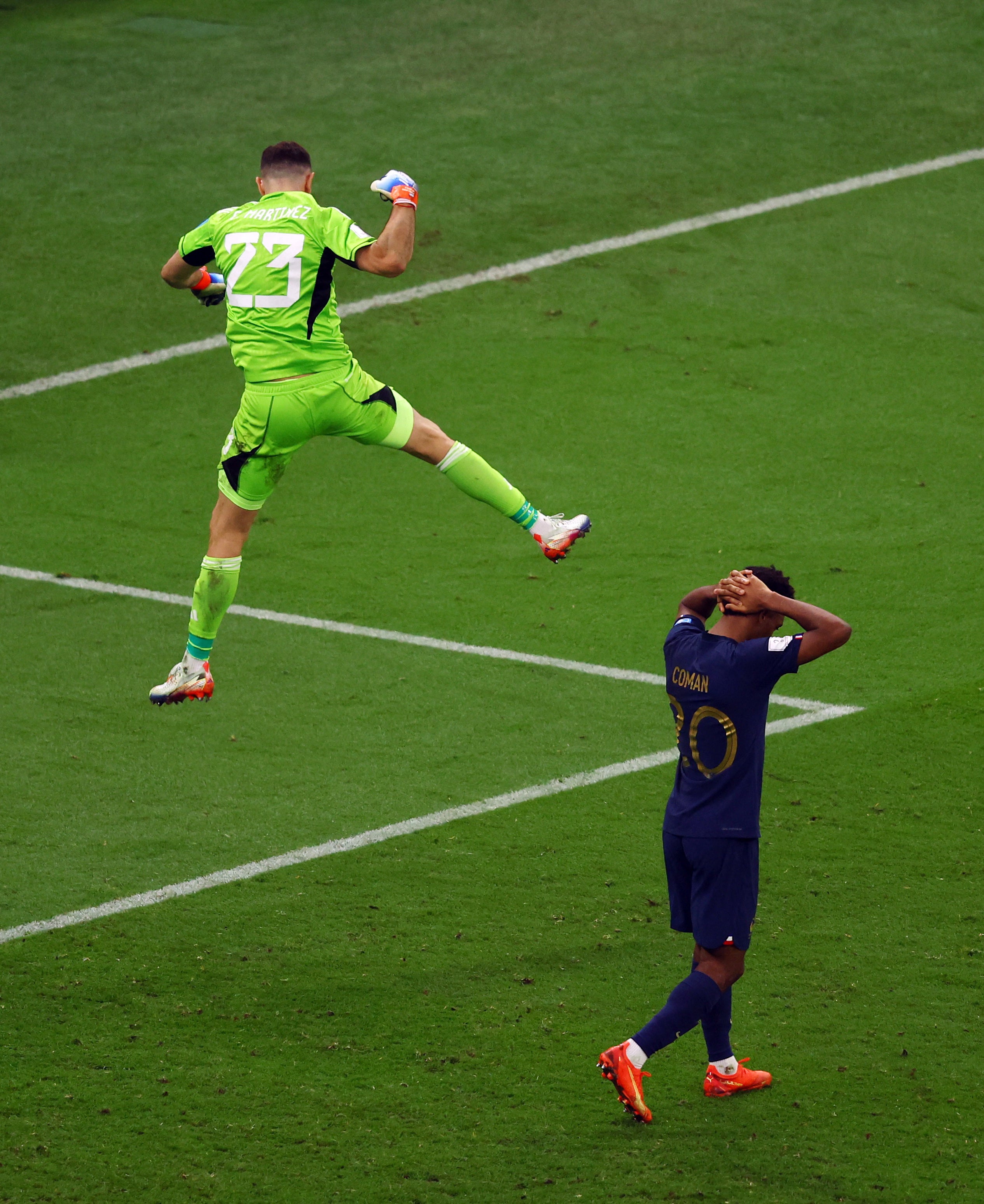 Martinez celebrates as Coman puts his hands on his head after having his penalty saved