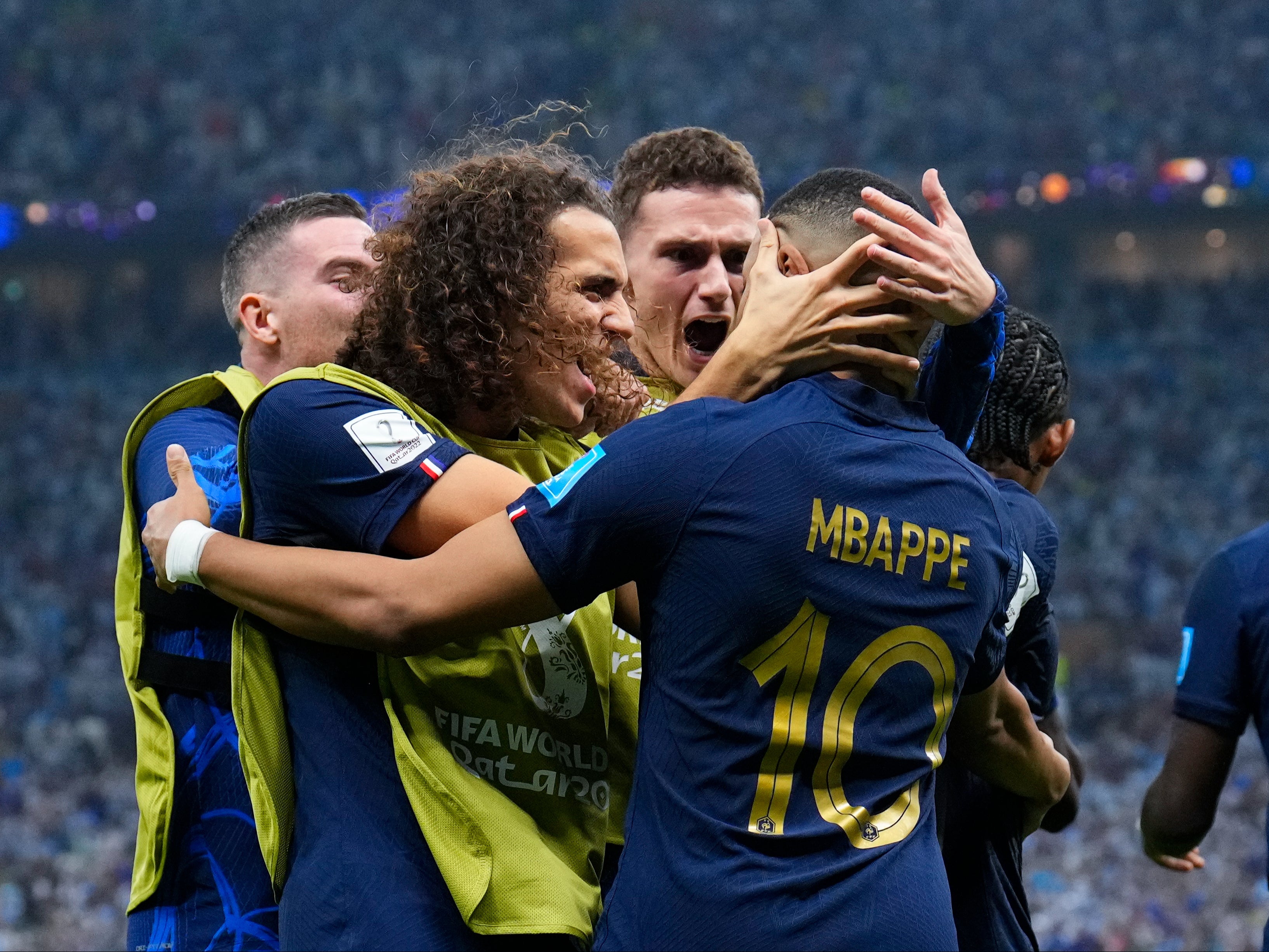 France players celebrate with Mbappe after he scored their third goal