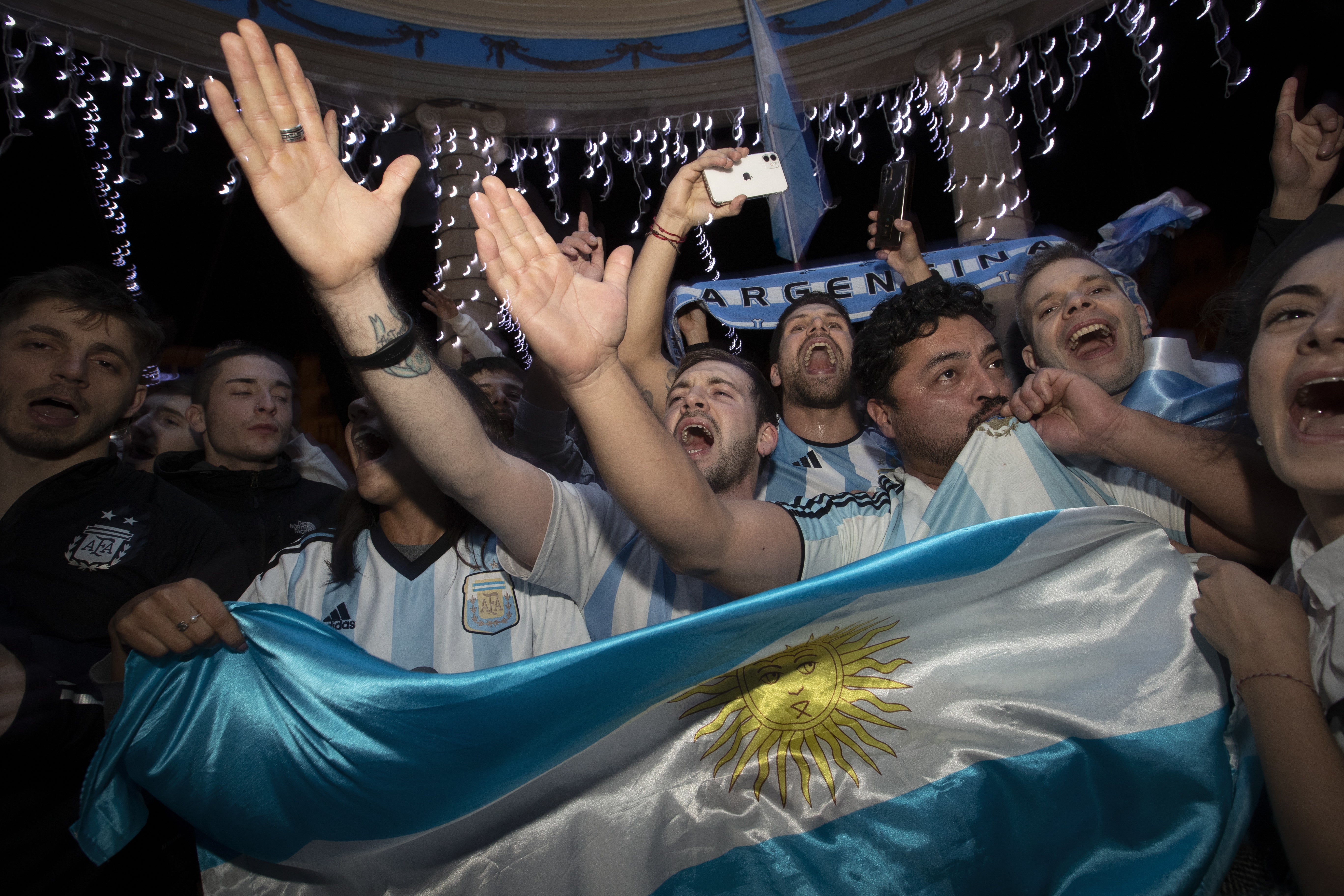 Argentina’s supporters celebrate victory at the Plaza del Castillo in downtown Pamplona, Navarre region, northern Spain