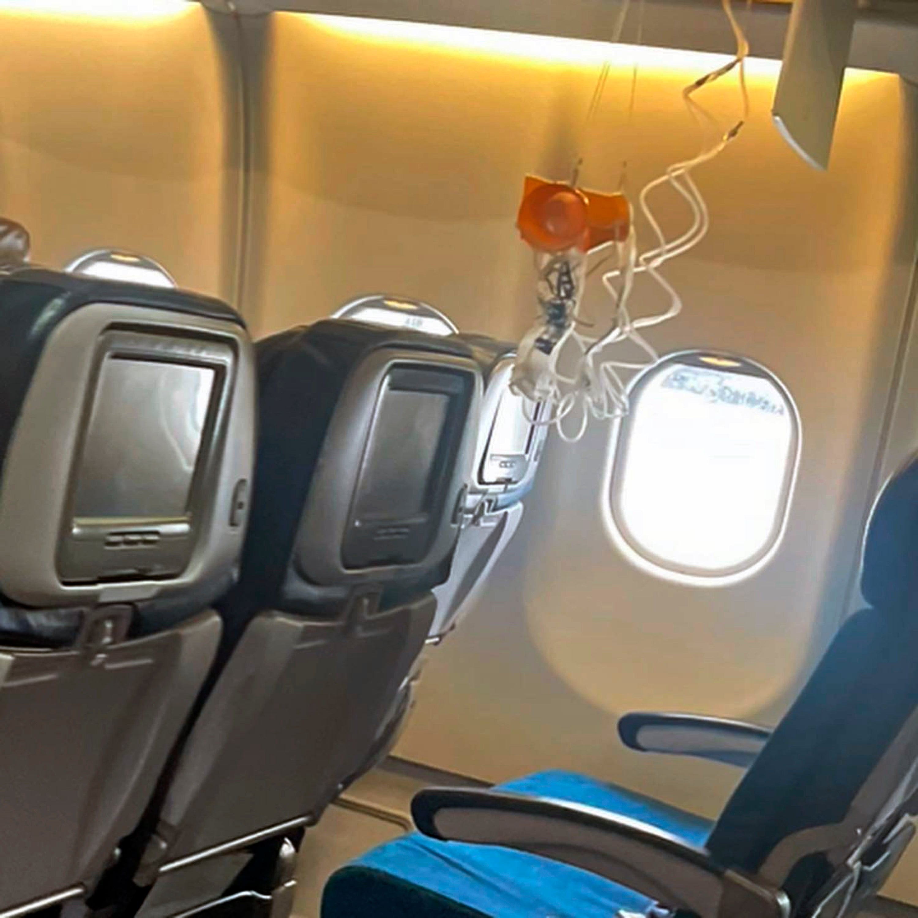 This mobile photo courtesy of passenger Jazmin Bitanga shows the interior of a Hawaiian Airlines plane on its flight from Phoenix to Honolulu, Sunday, 18 December2022