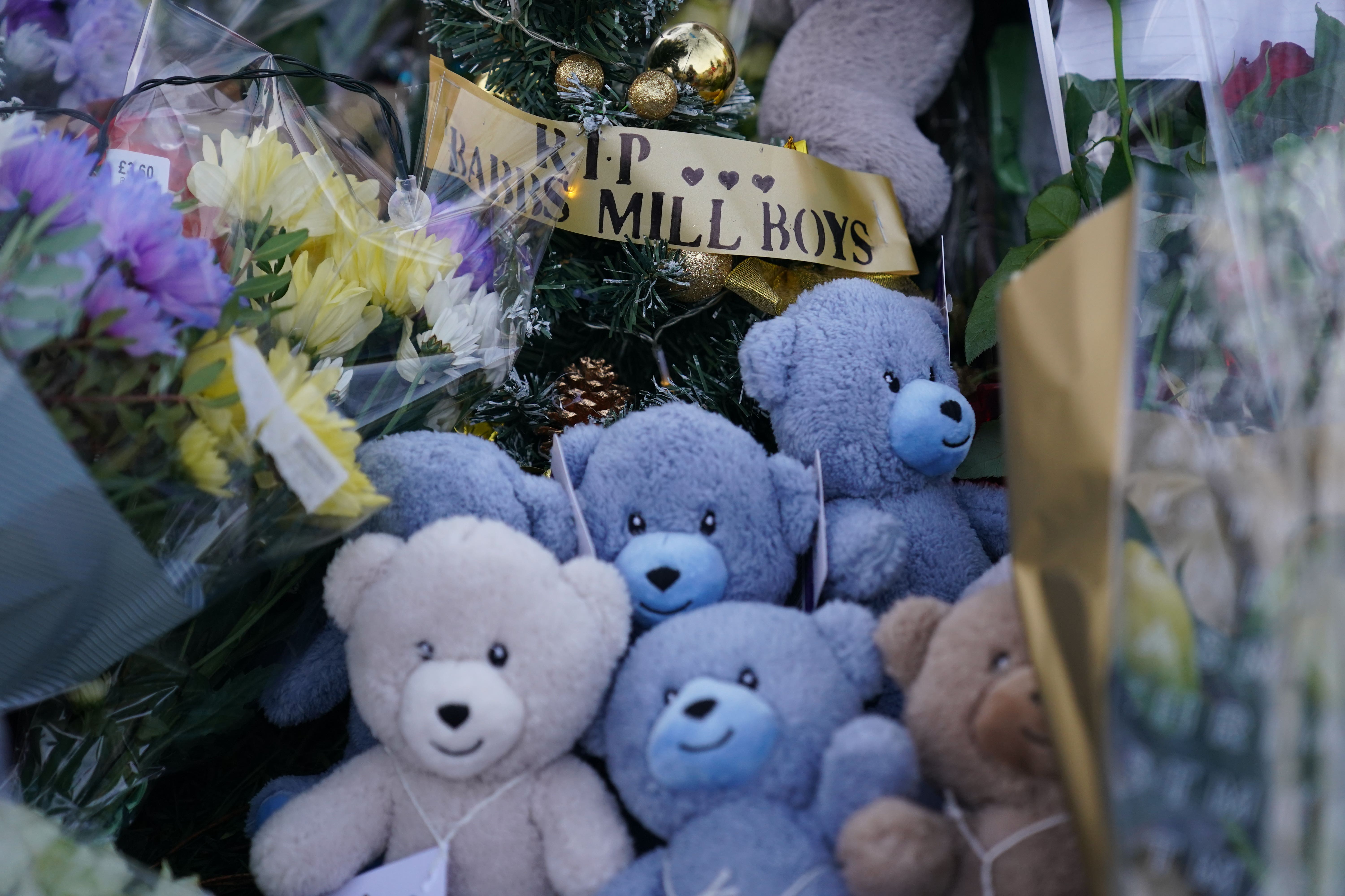 Tributes at a makeshift shrine near the Babbs Mill Lake, in Kinghurst, Solihull. (Jacob King/PA)