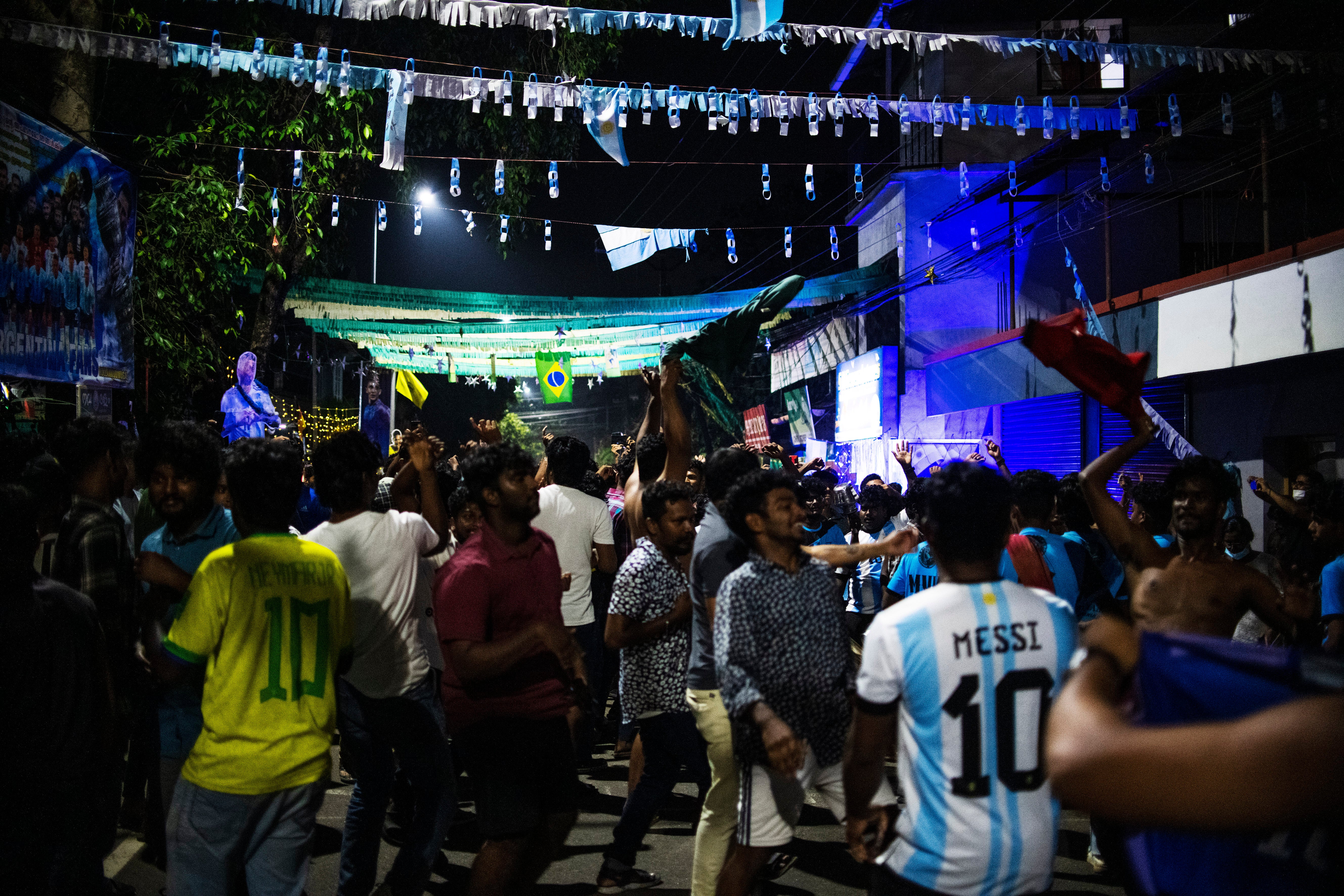 Argentina fans in Kochi, Kerala state, India, celebrate their team’s victory in the World Cup final soccer match between Argentina and France in Qatar, Sunday, 18 December 2022