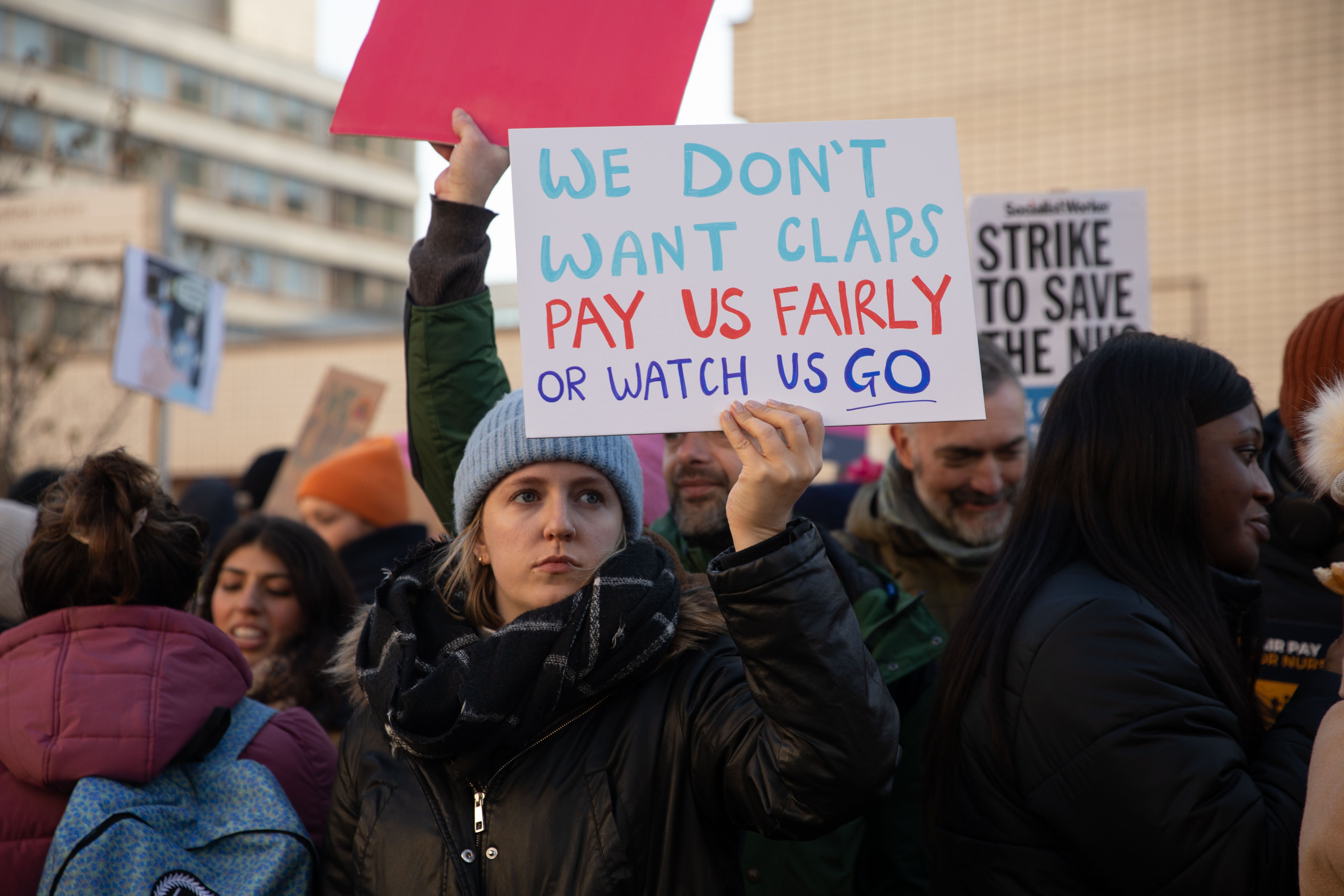 Members of the Royal College of Nursing (RCN) on the picket line outside St Thomas’ Hospital in London (Lucy North/PA)