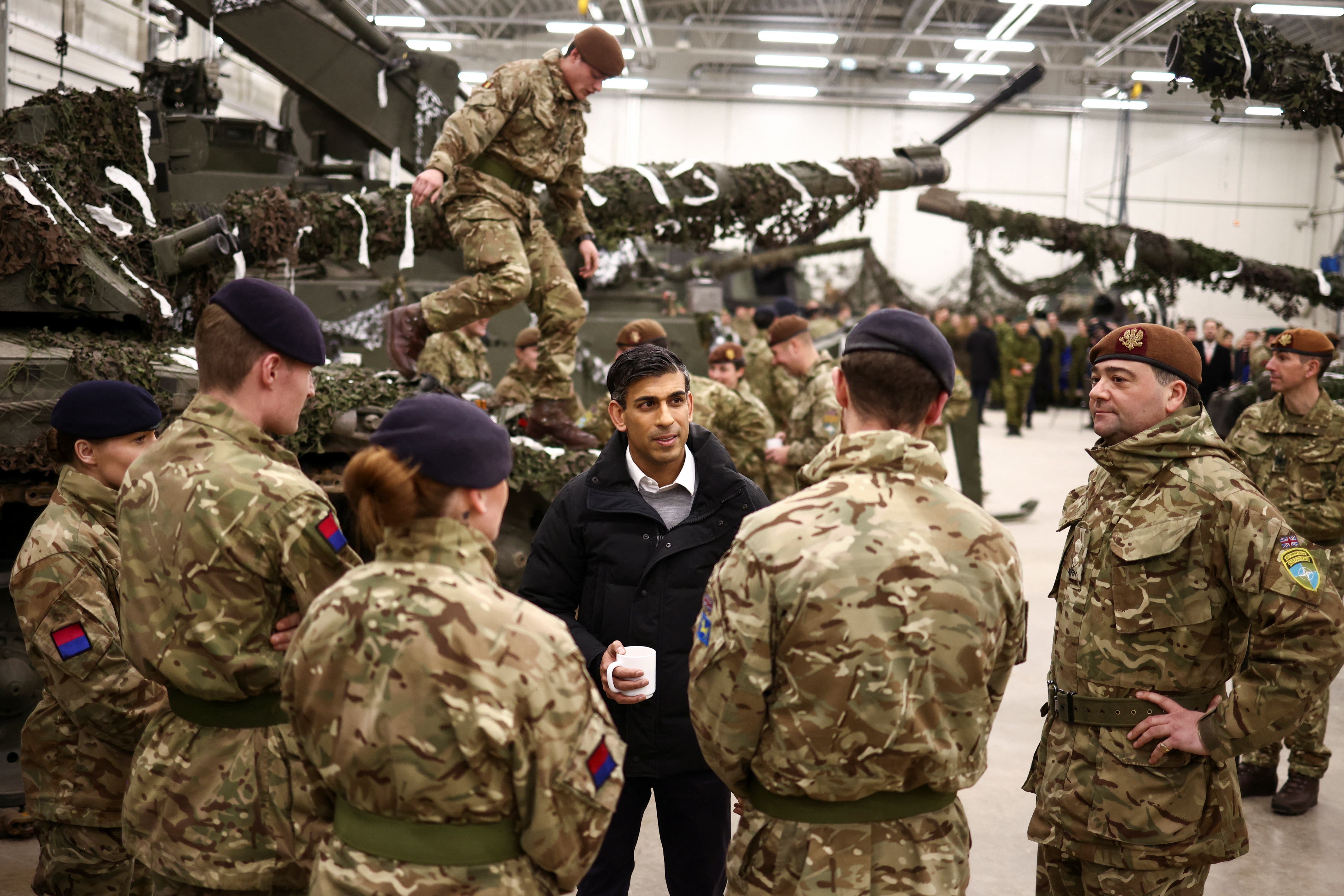 Rishi Sunak talks with Nato troops at the Tapa military base in Estonia (Henry Nicholls/PA)