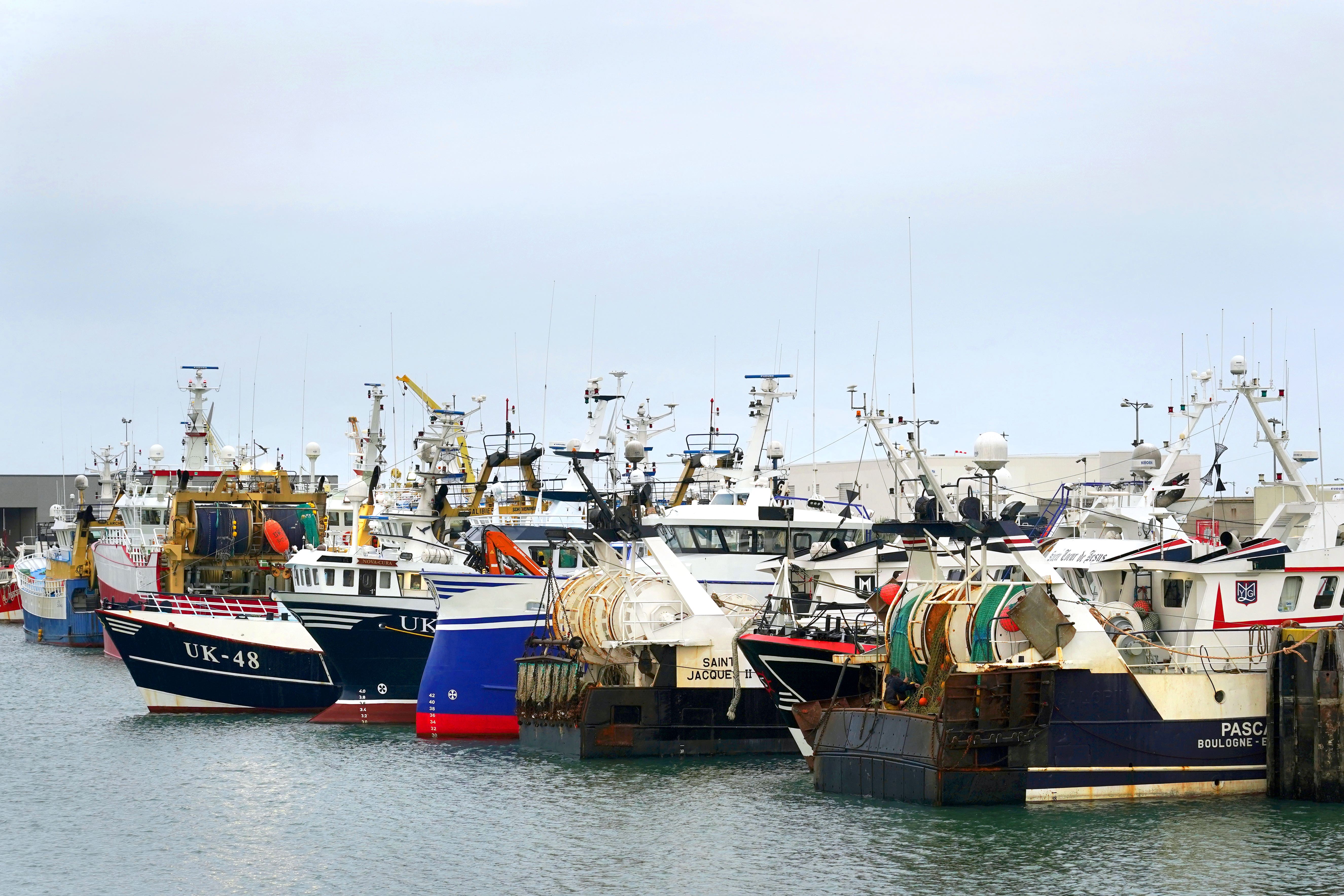 Fishing boats moored in the port of Boulogne, France (Gareth Fuller/PA)