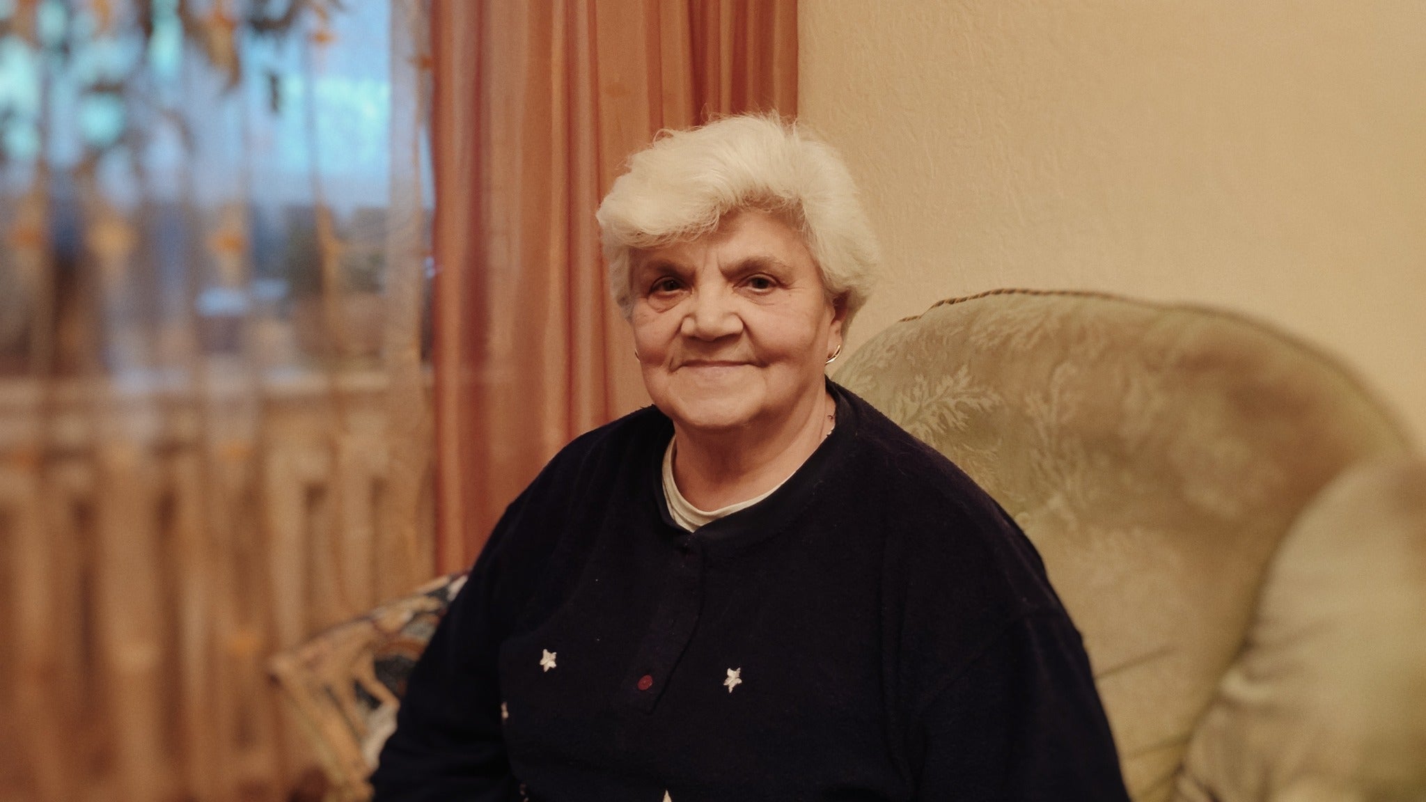 Serhii Zhelieznov’s mother Liudmyla, 78, stayed behind in Kyiv when the war started but a year on, the attacks continue