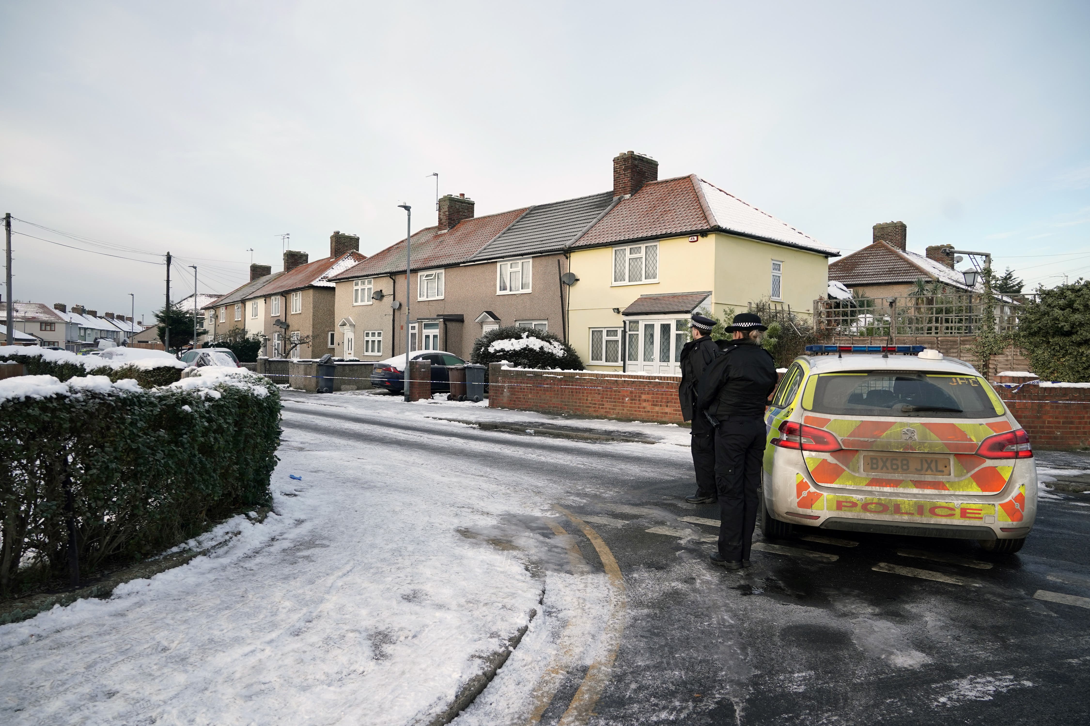 Police on Cornwallis Road, Dagenham, where the two boys died (Yui Mok/PA)