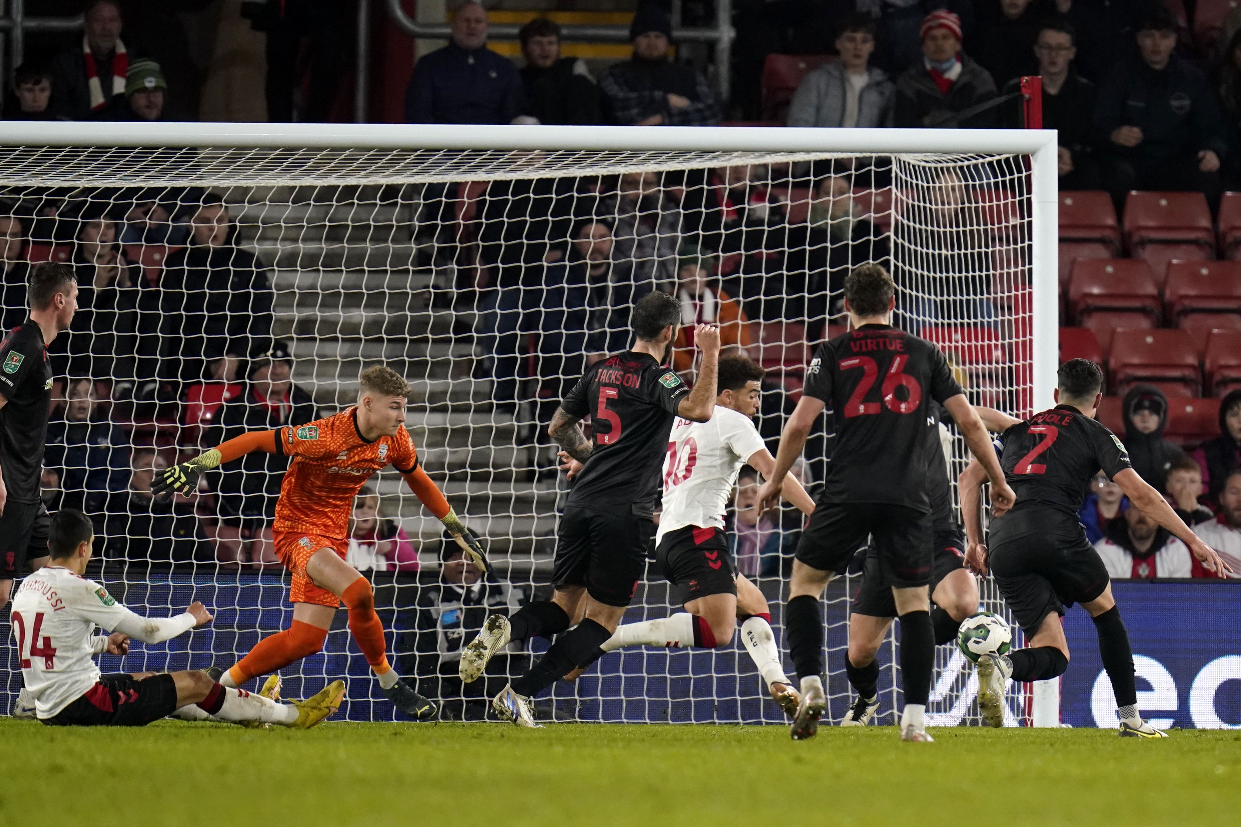 Che Adams, centre, scores Southampton’s second goal (Andrew Matthews/PA)