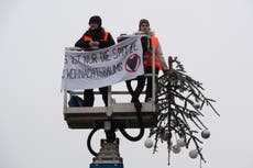 Climate activists decapitate prominent Berlin Christmas tree