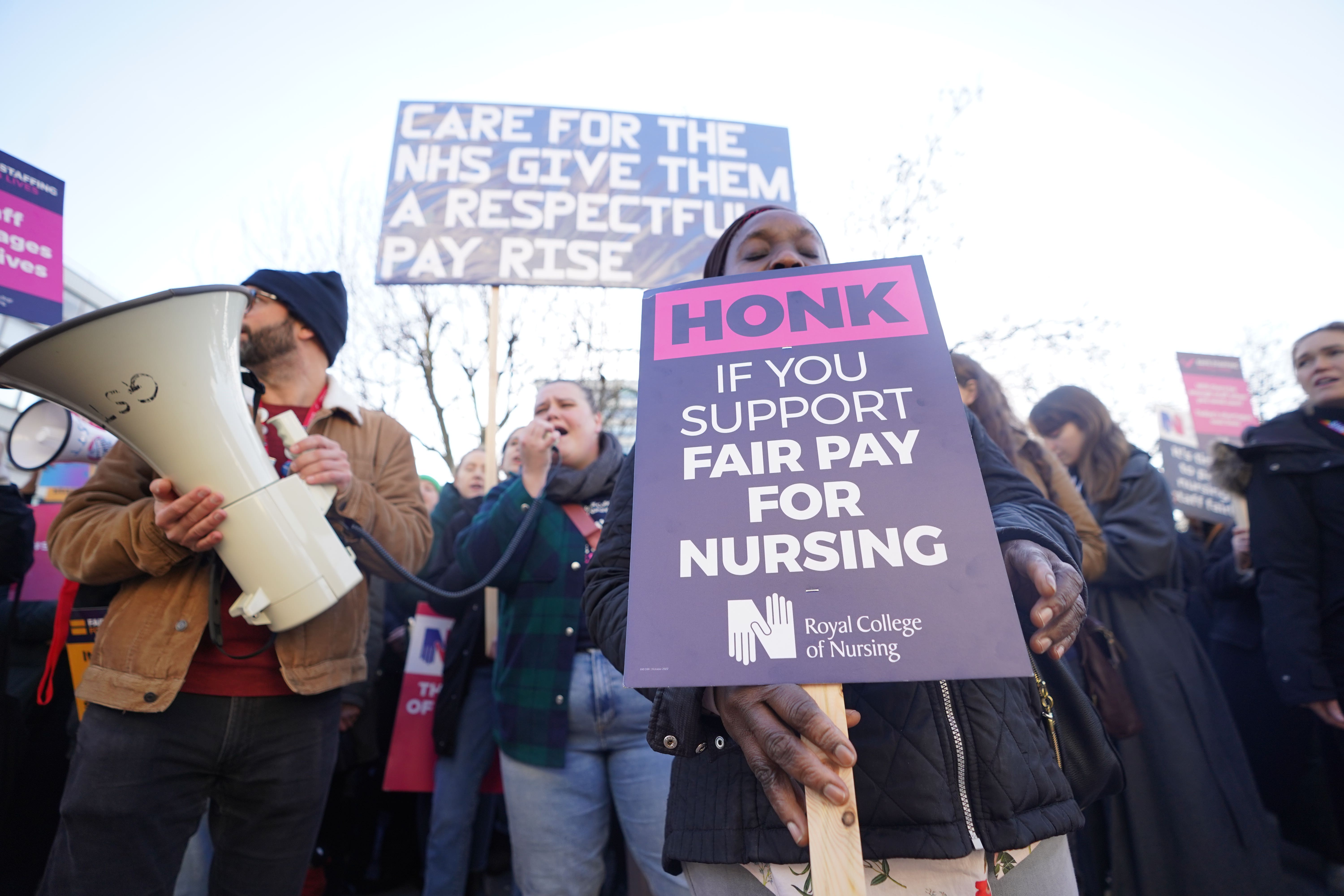 Members of the Royal College of Nursing (RCN) on the picket line outside St Thomas’ Hospital, central London (James Manning/PA)