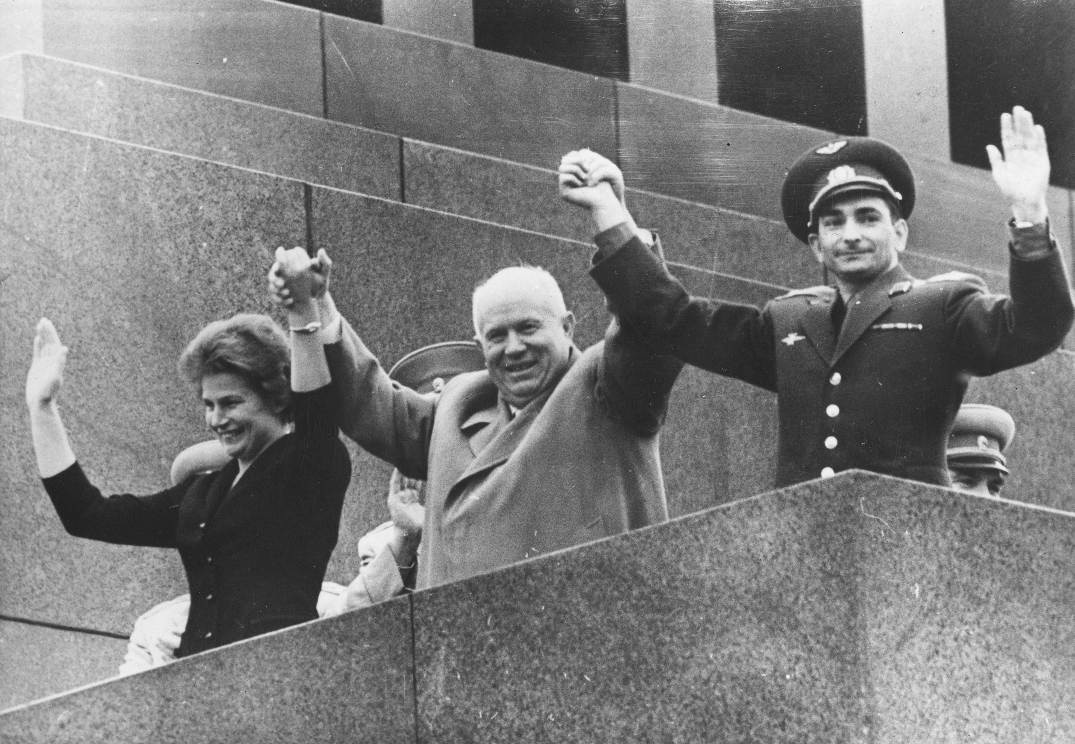 Tereshkova’s arm is held aloft by USSR premier Nikita Krushchev