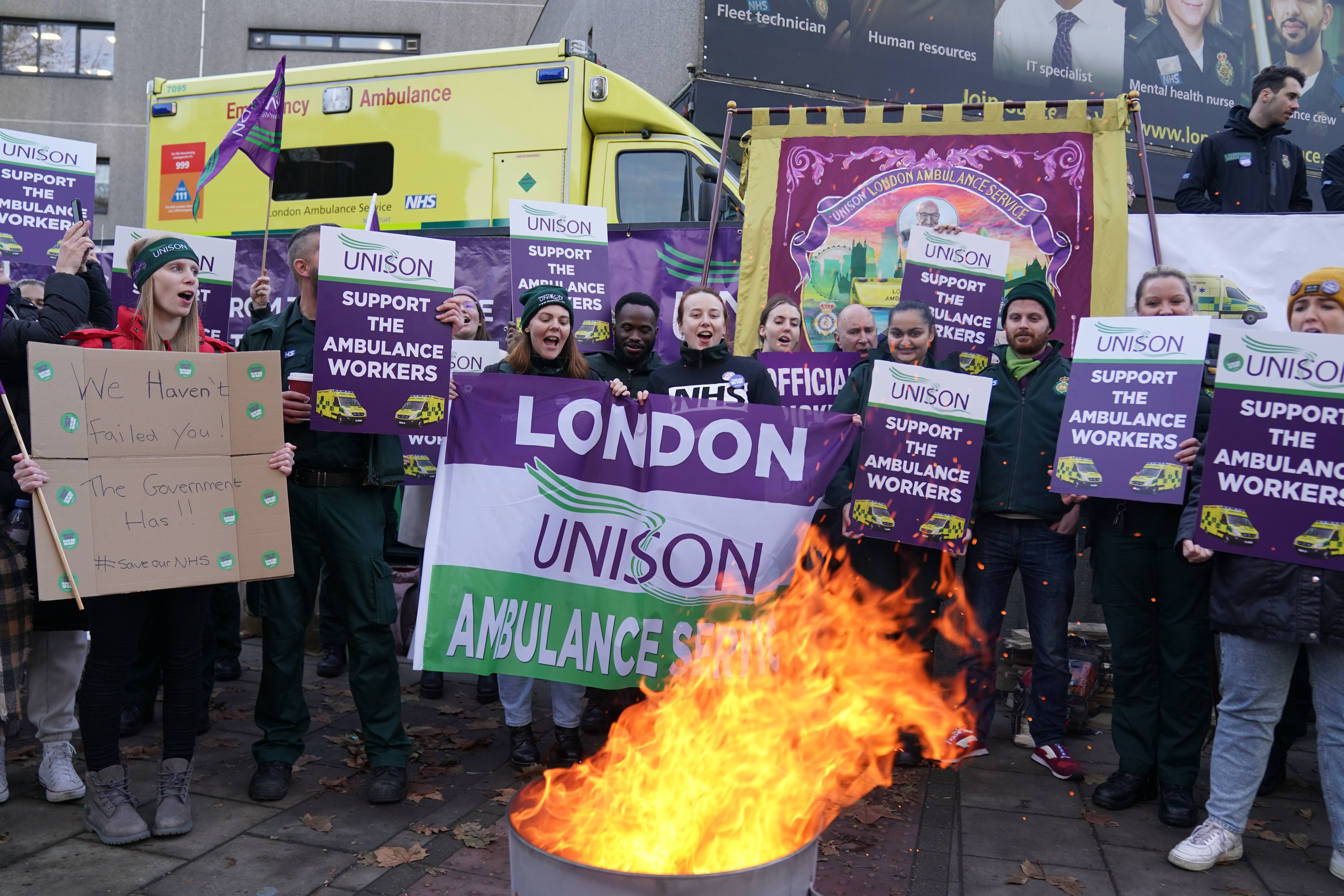 Ambulance staff on picket line on Wednesday (PA)