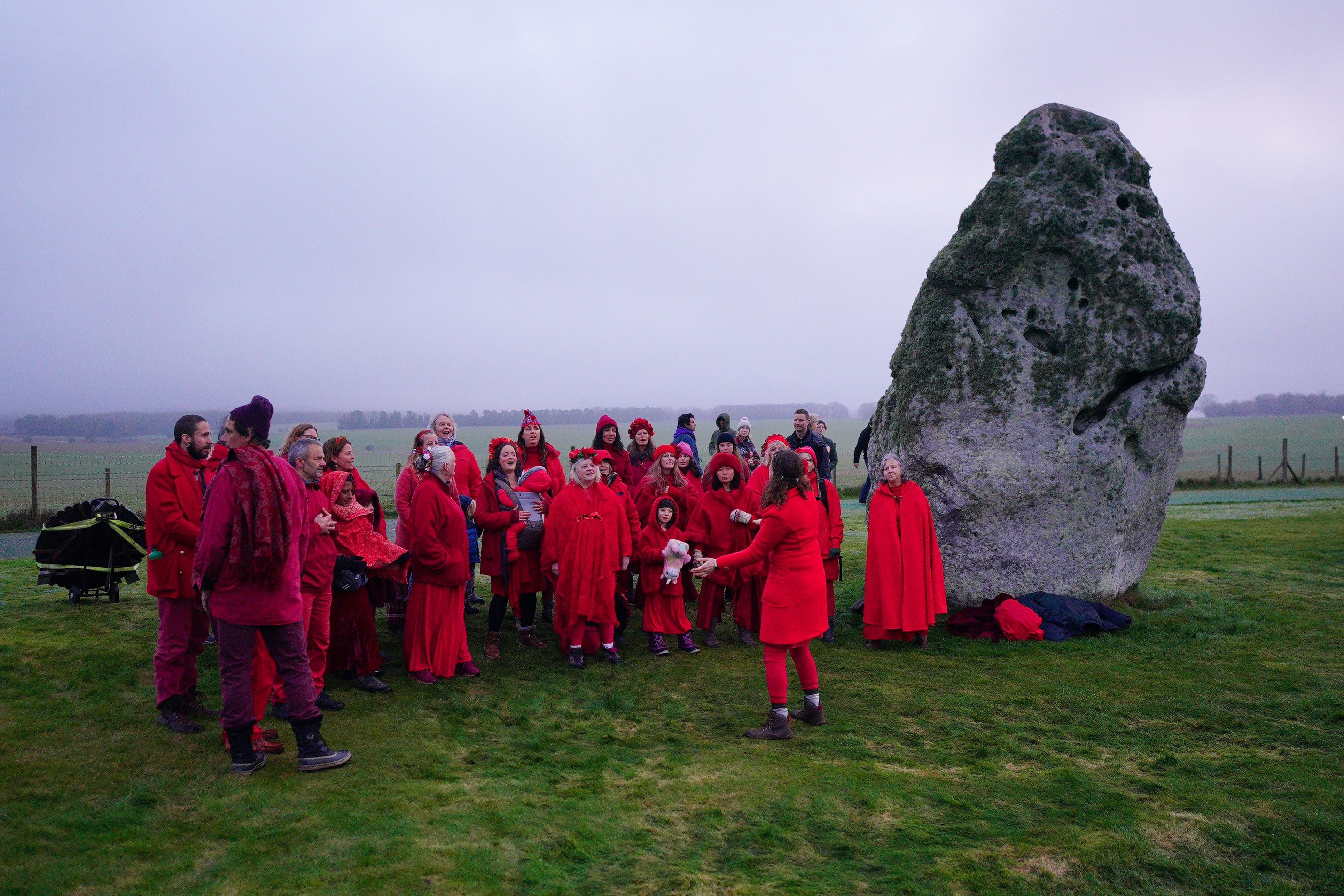 People take part in the winter solstice celebrations at Stonehenge in Wiltshire (Ben Birchall/PA)