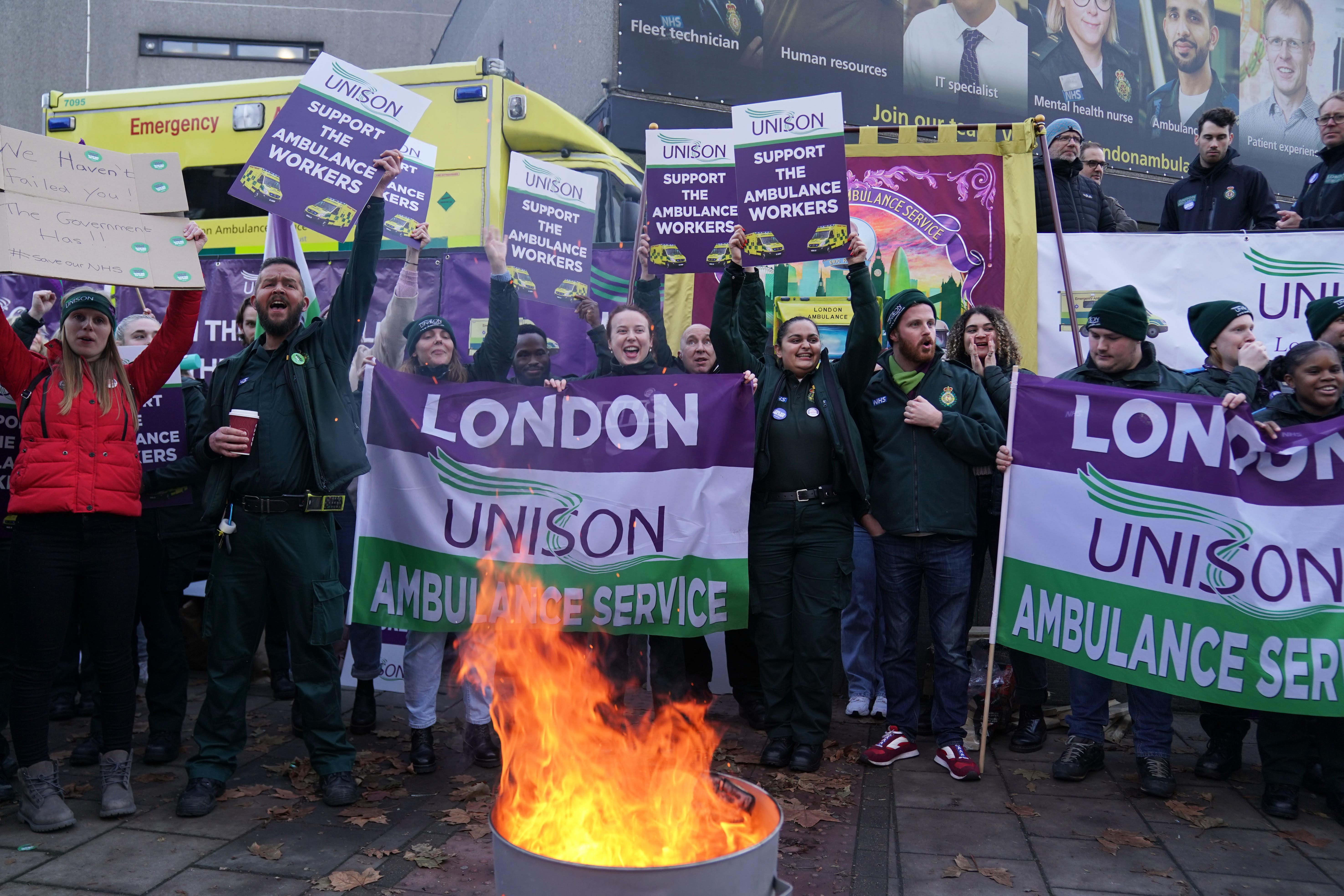 Ambulance workers on the picket line outside Waterloo ambulance station in London (Kirsty O’Connor/PA)