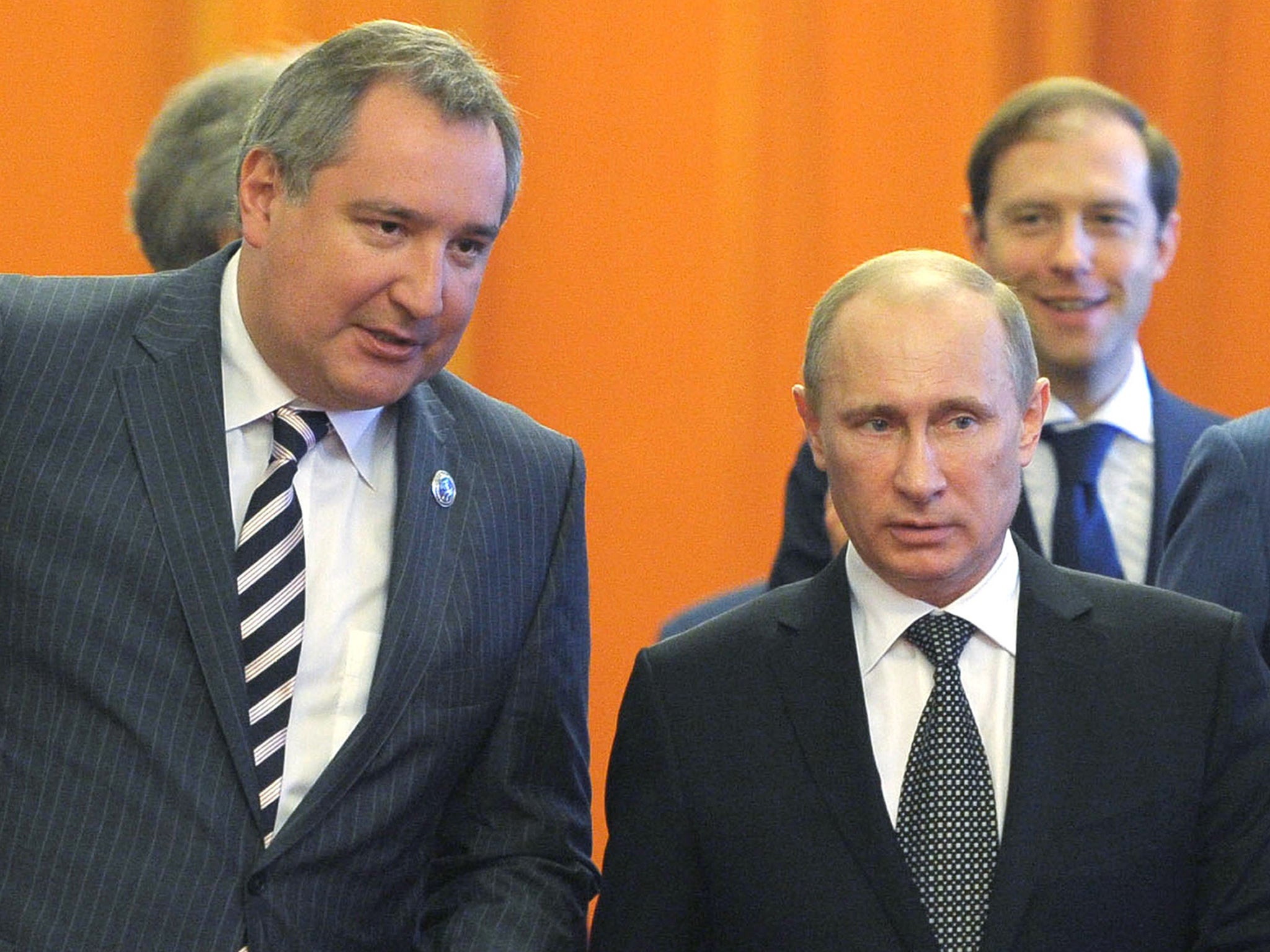 Rogozin with Putin on a diplomatic trip to Beijing in 2012