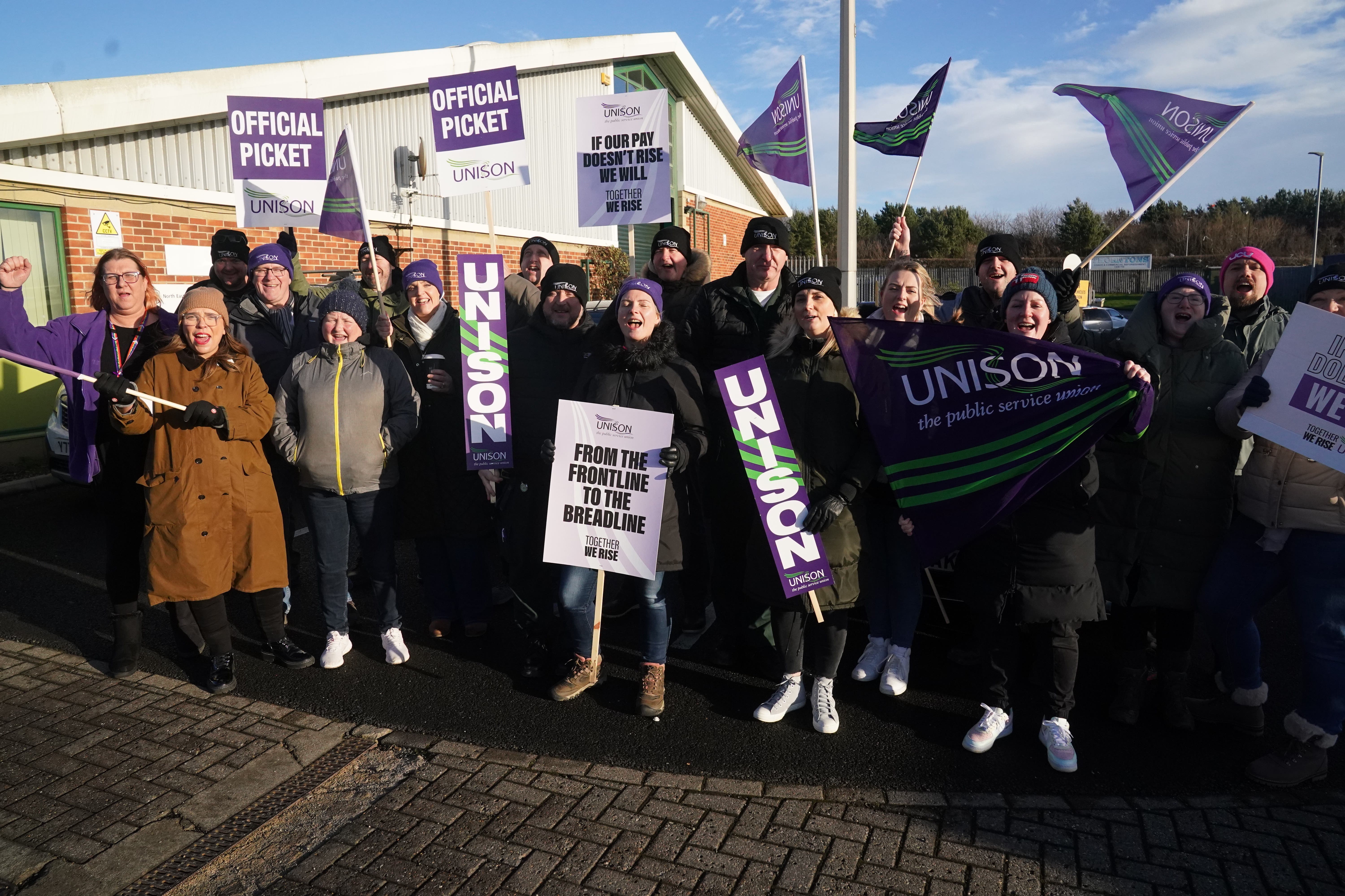 Ambulance workers on the picket line (Owen Humphreys/PA)