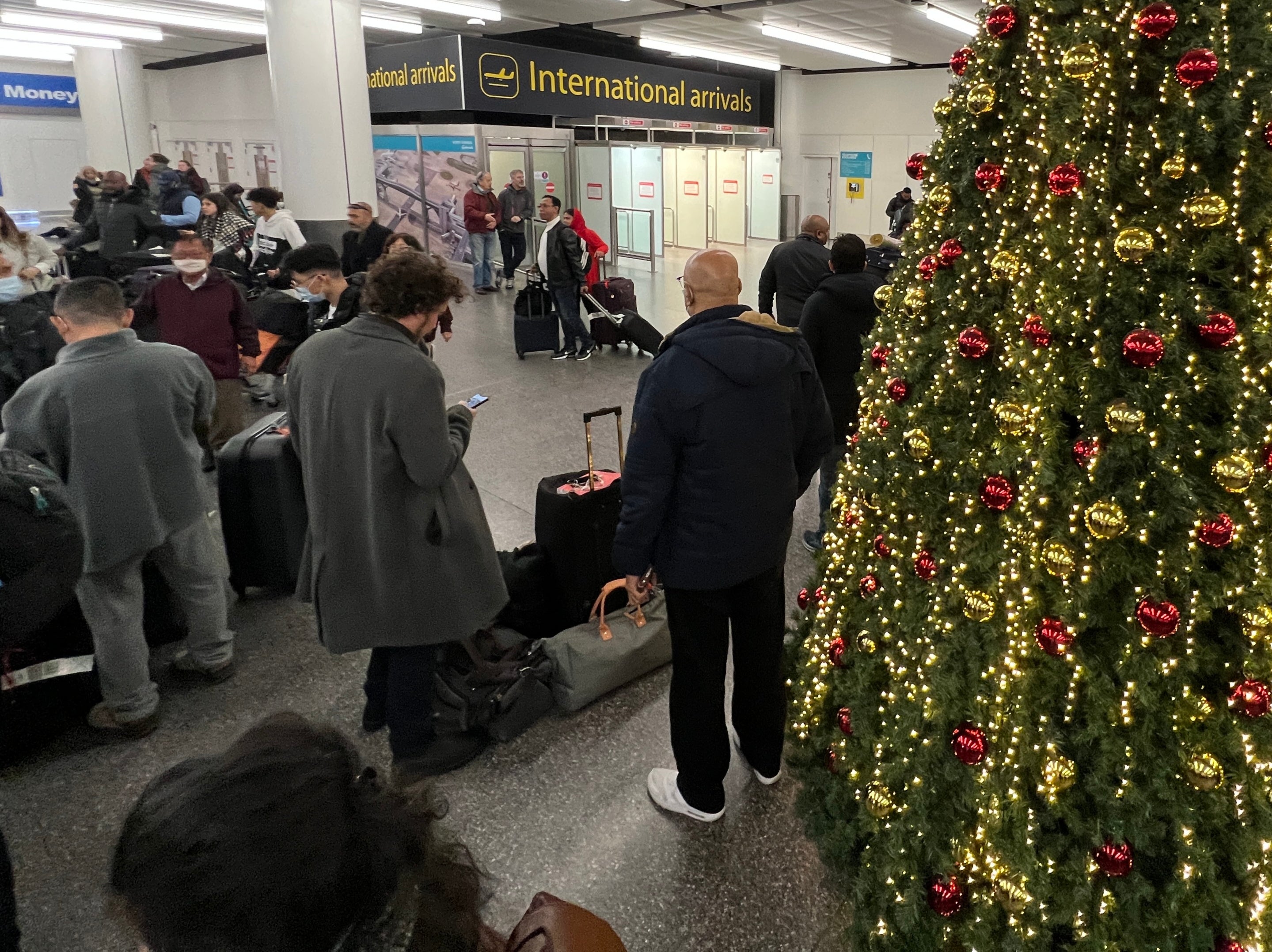 Passengers wait at Gatwick Airport