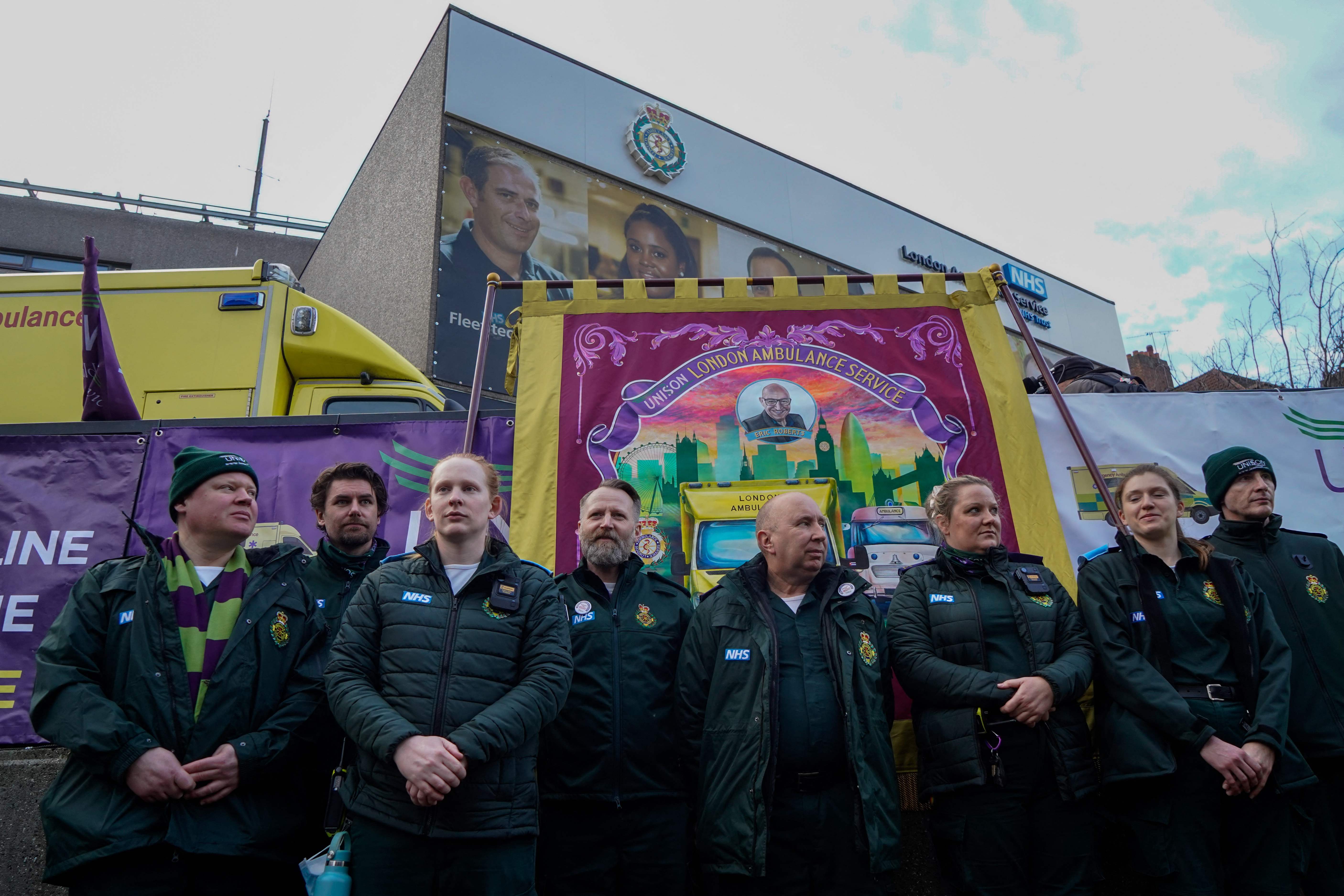 Ambulance workers gather at a picket line outside the Waterloo ambulance station in London