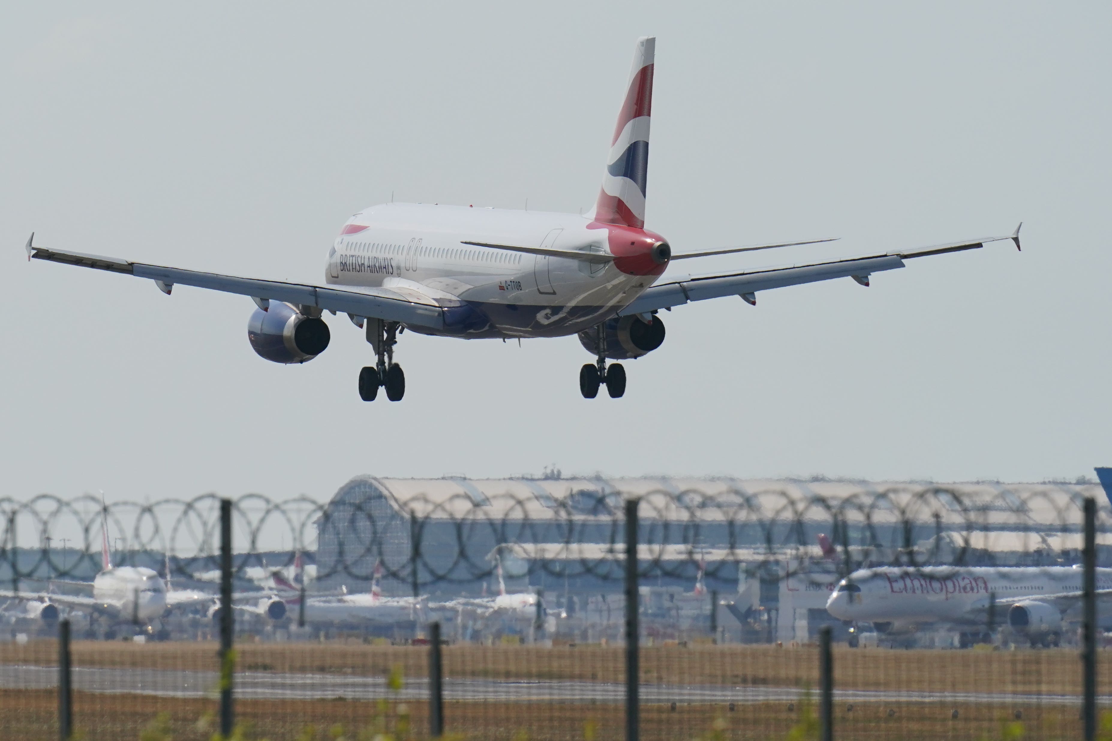 Military personnel checking passports at UK airports appear to be ensuring passengers are not being delayed on the first day of Border Force strikes (Jonathan Brady/PA)