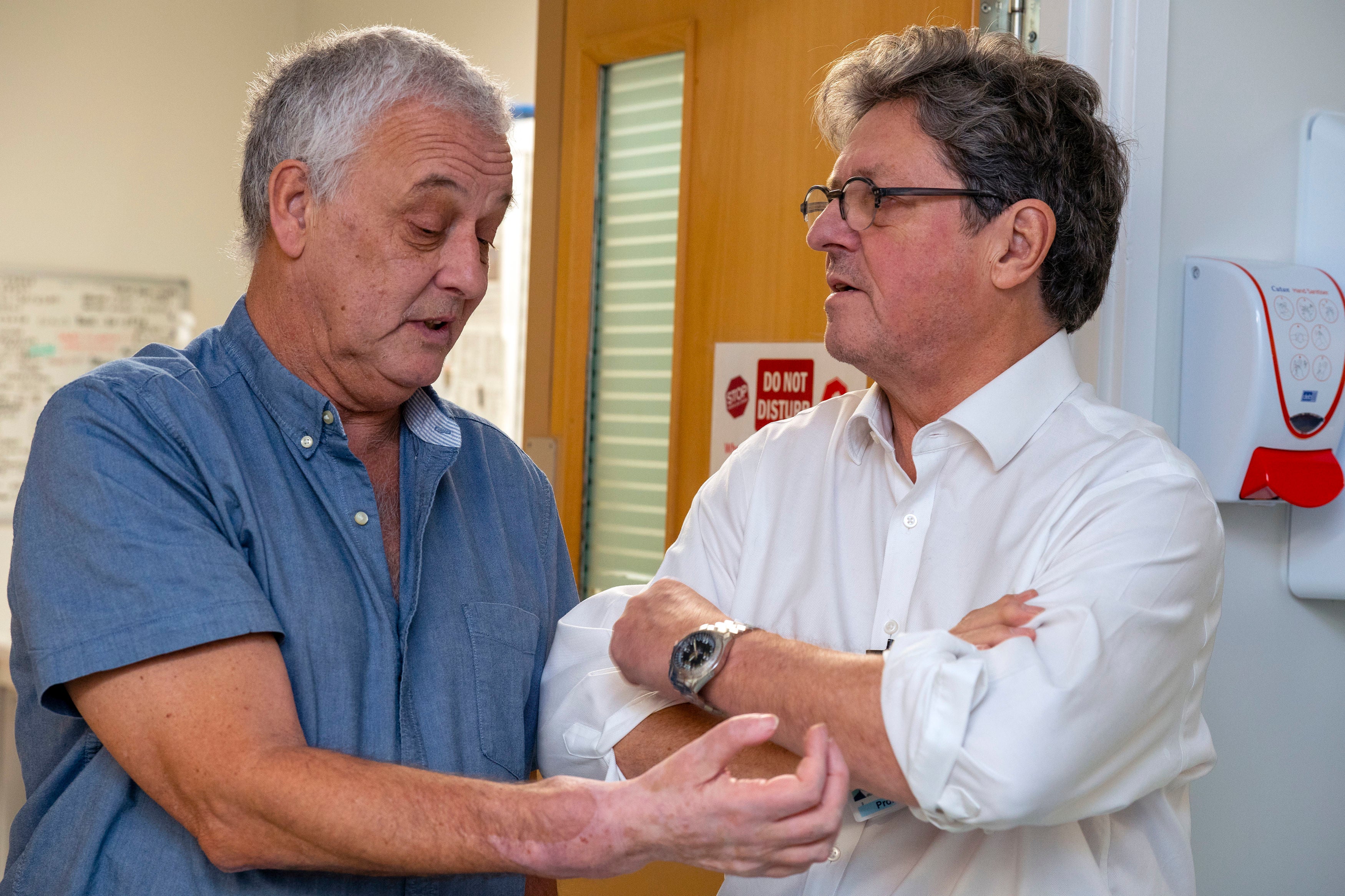 Hand transplant patient Mark Cahill with surgeon Simon Kay at Leeds General Infirmary