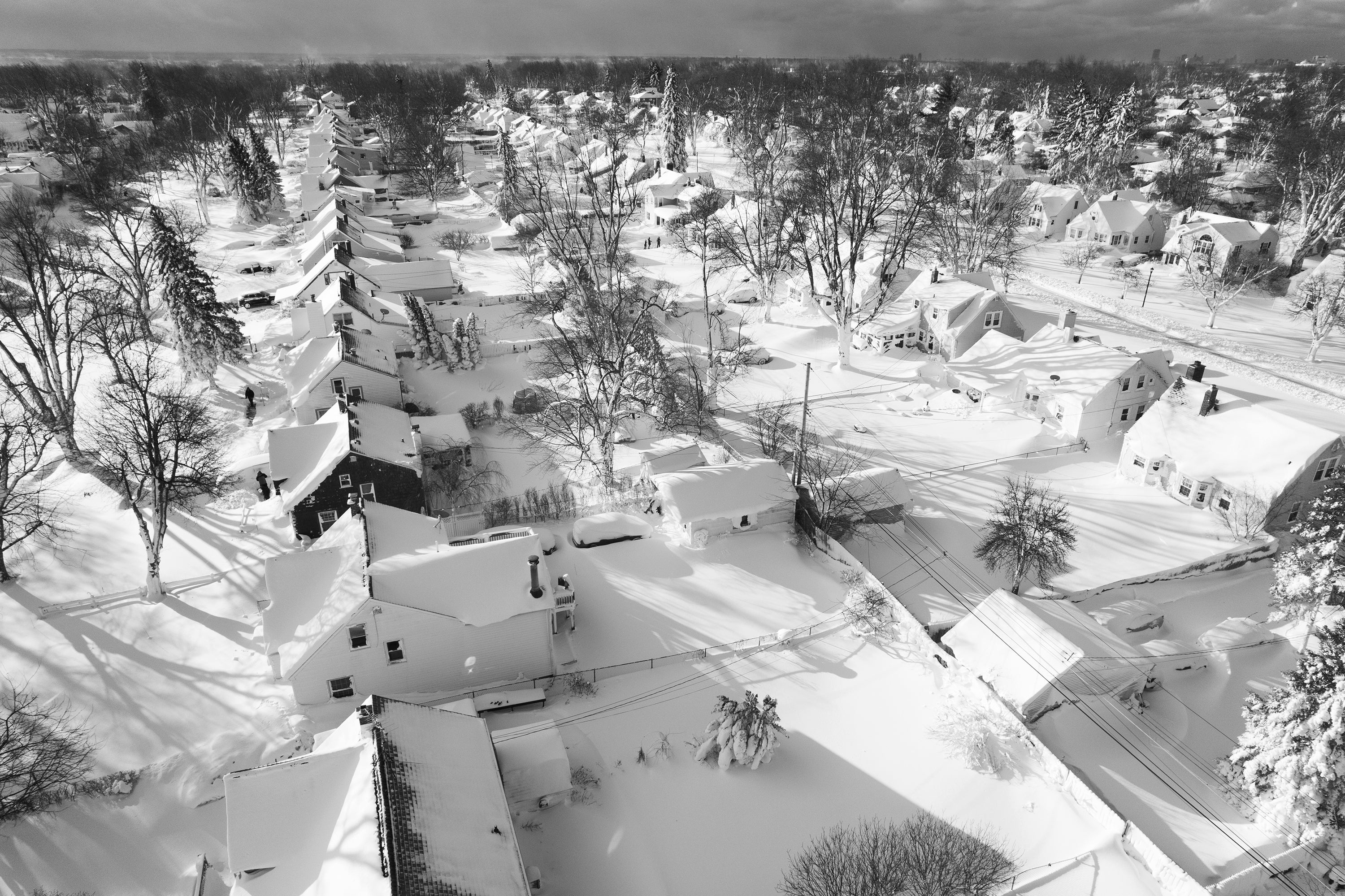 Snow blankets Cheektowaga, New York, as millions of people hunker down amid freezing temperatures