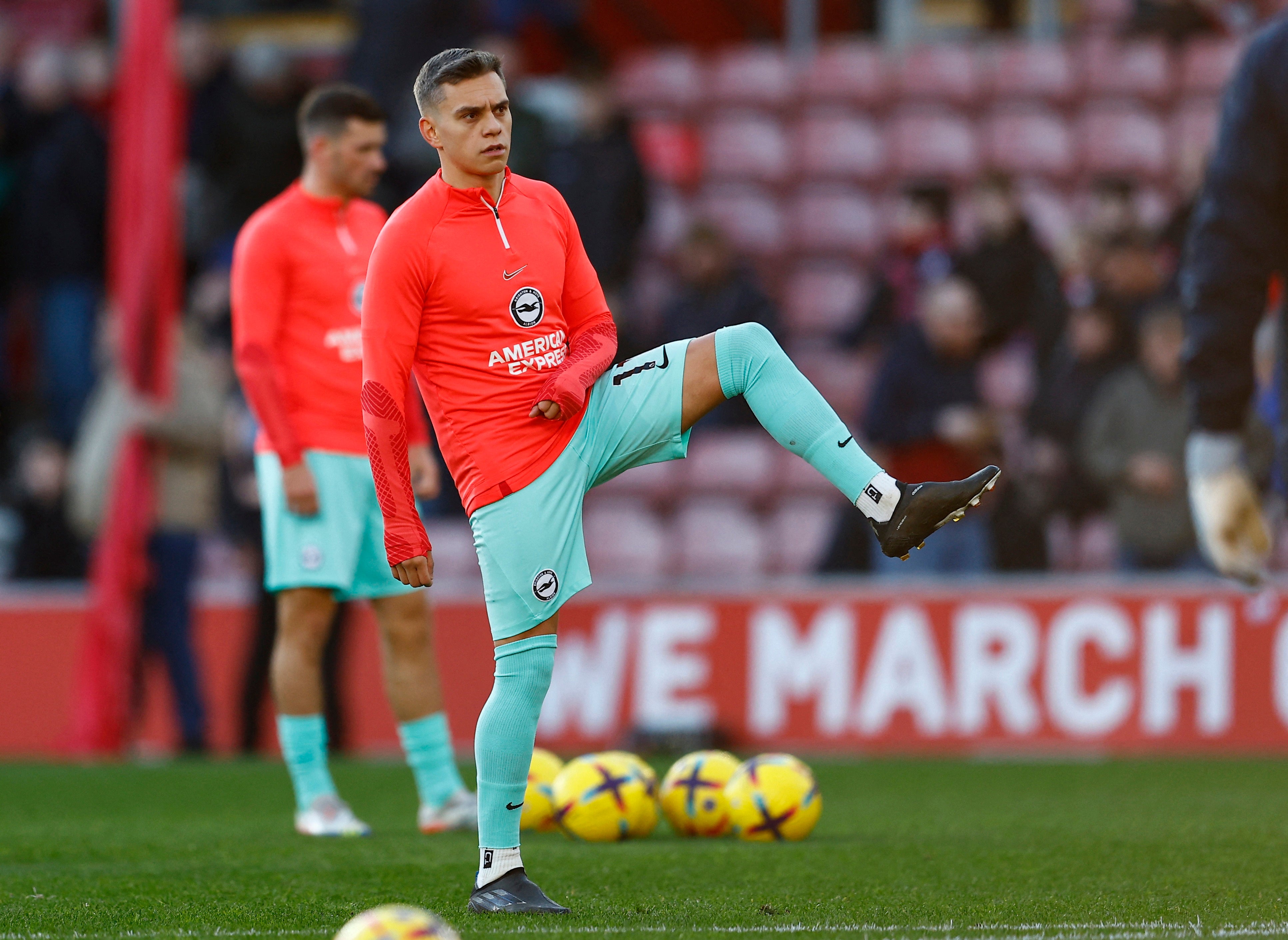 Leandro Trossard warms up before kick-off against Southampton